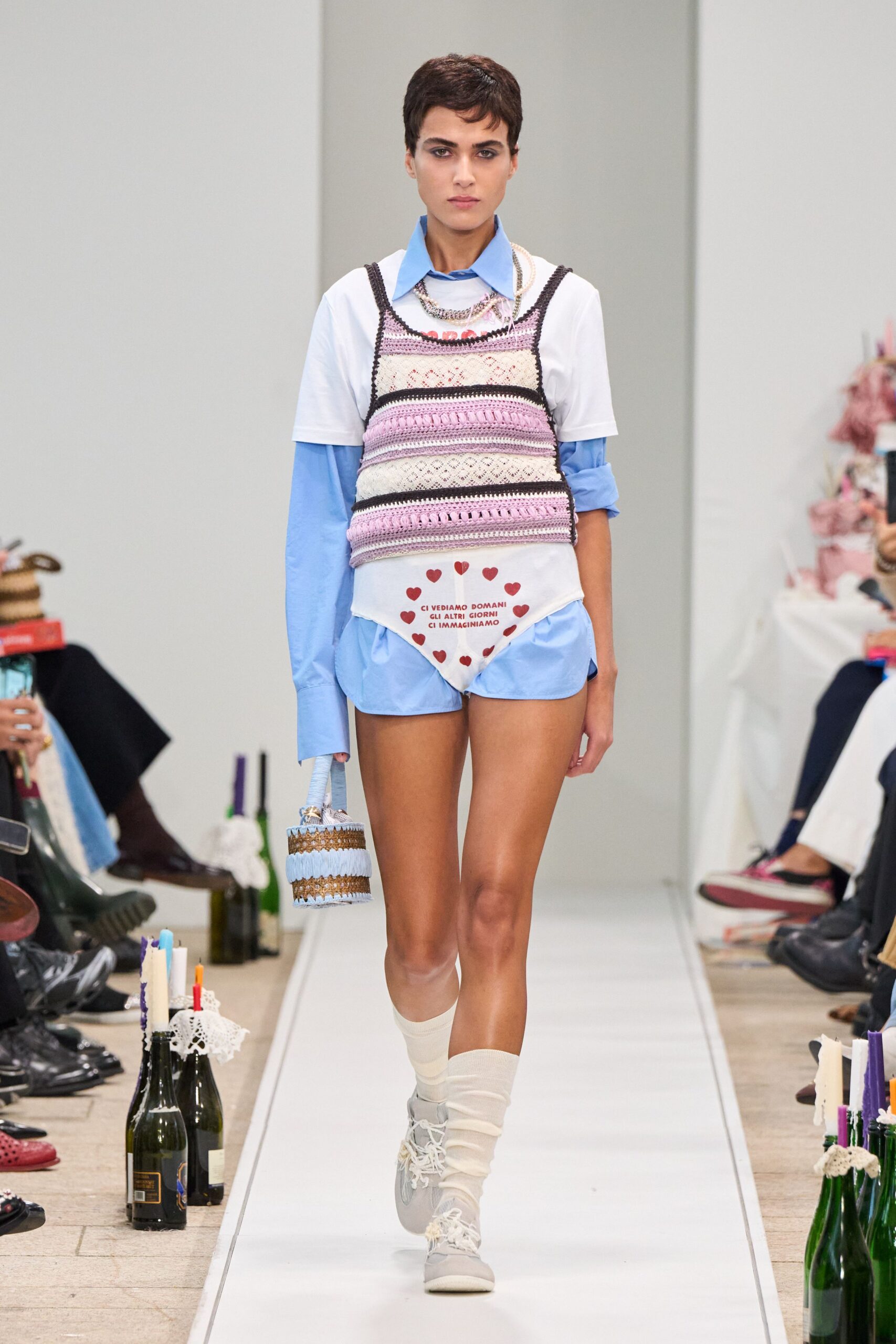 multi-colored sweater over white shirt
