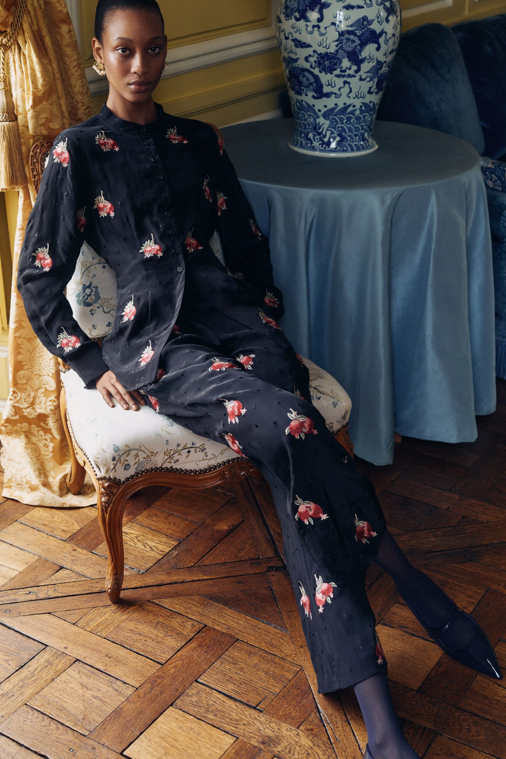 black silk long-sleeve collared fitted floral buttoned jumpsuit