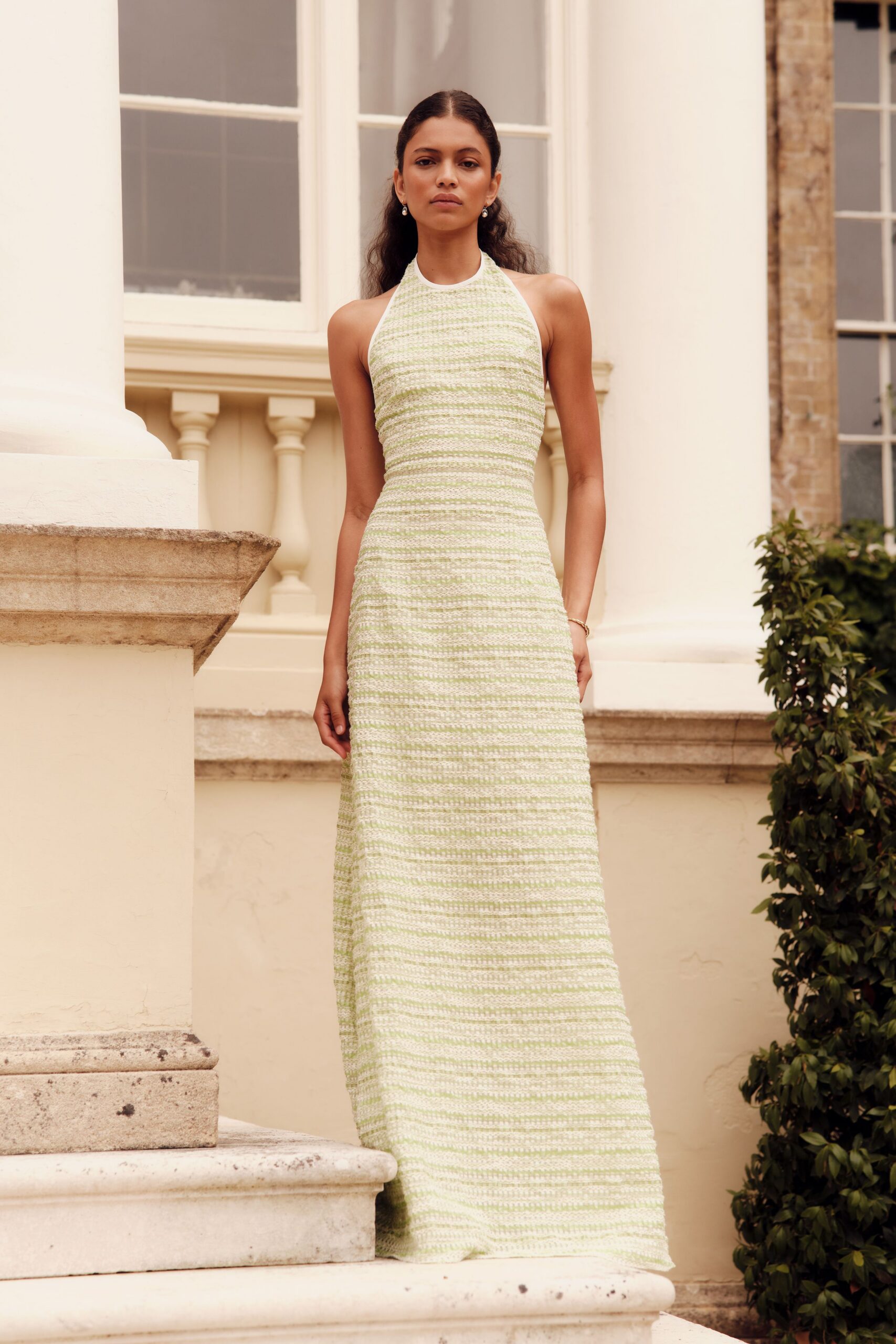 fitted green sleeveless gown