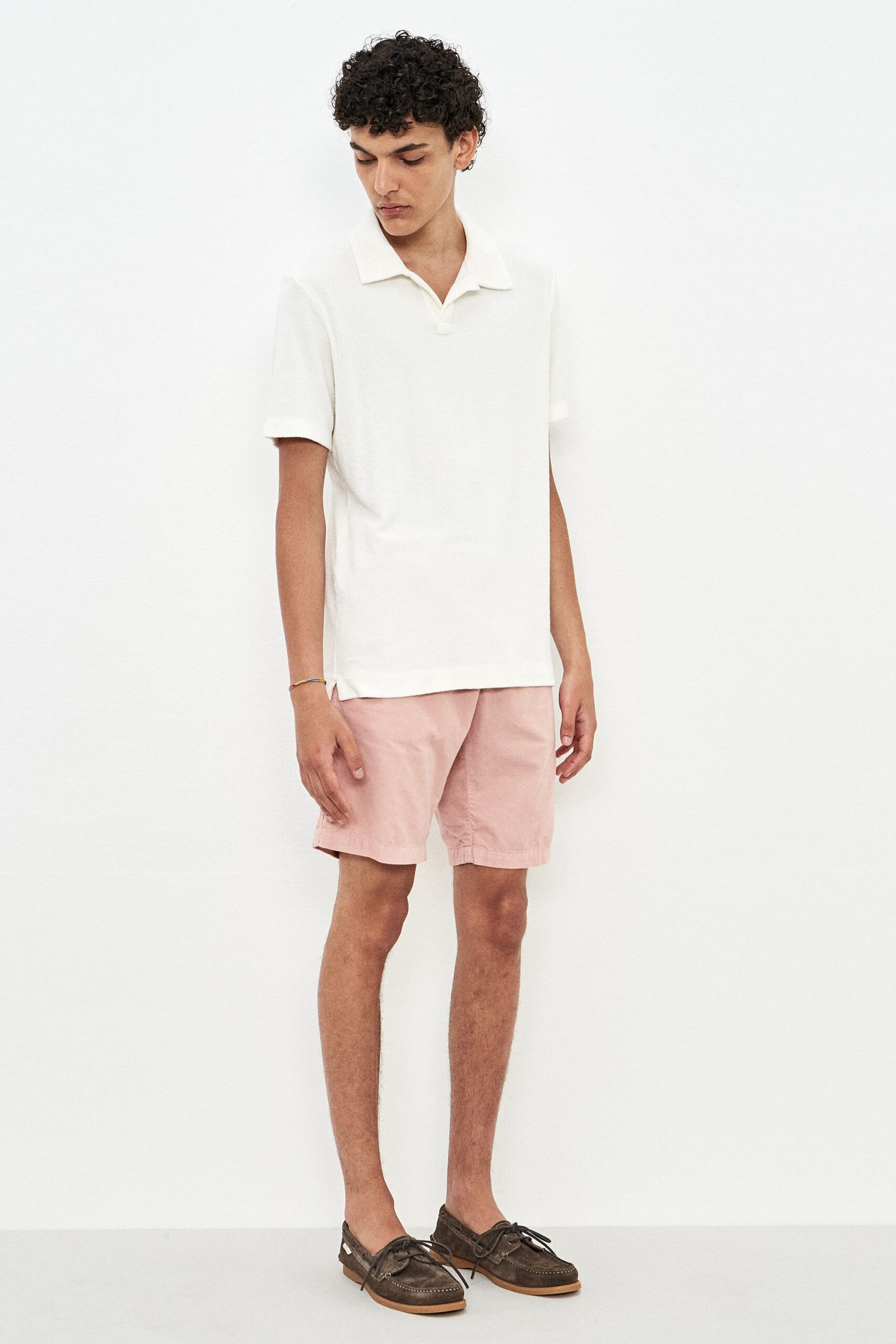 white shirt pink shorts brown shoes