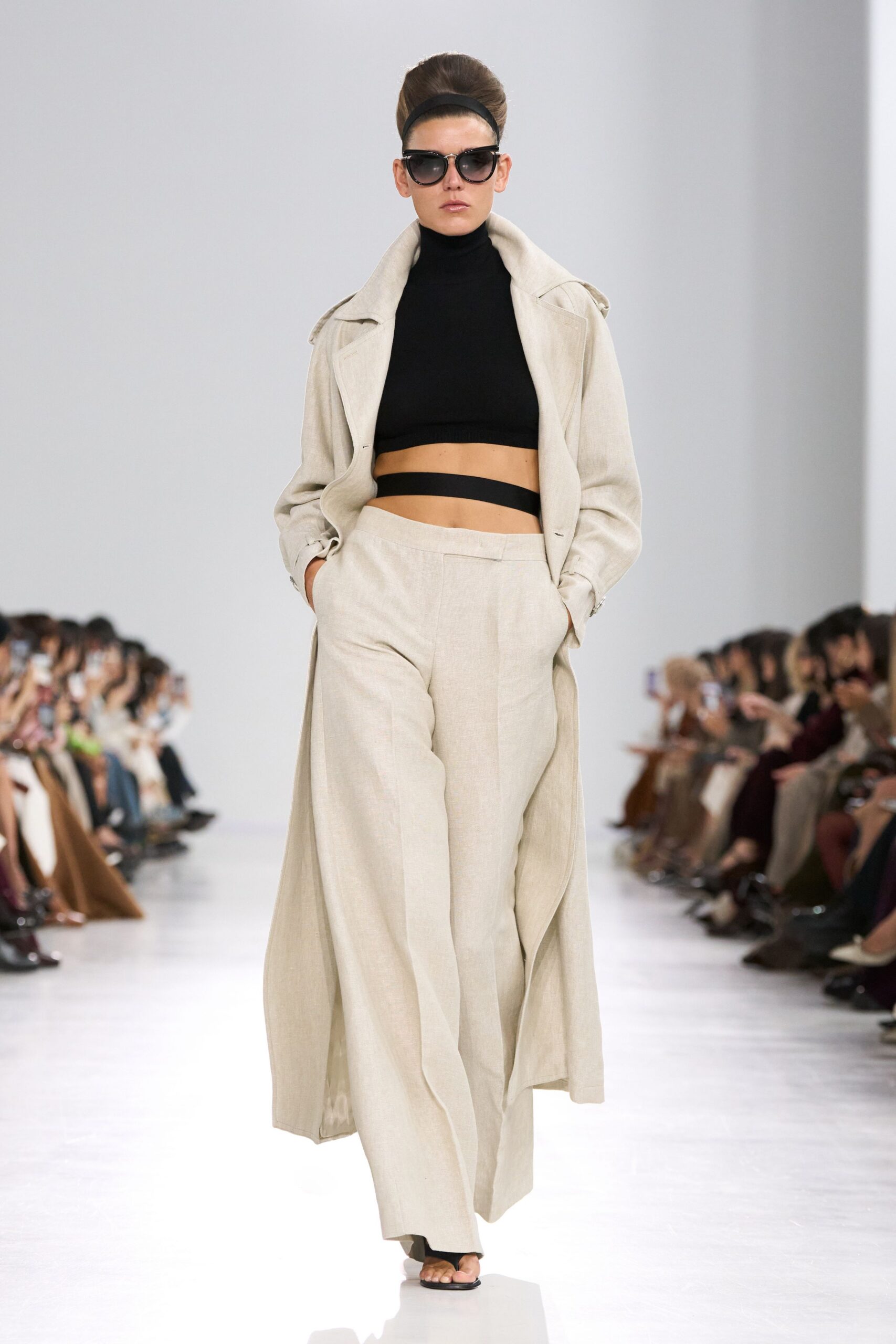 beige coat black top wide-leg pants