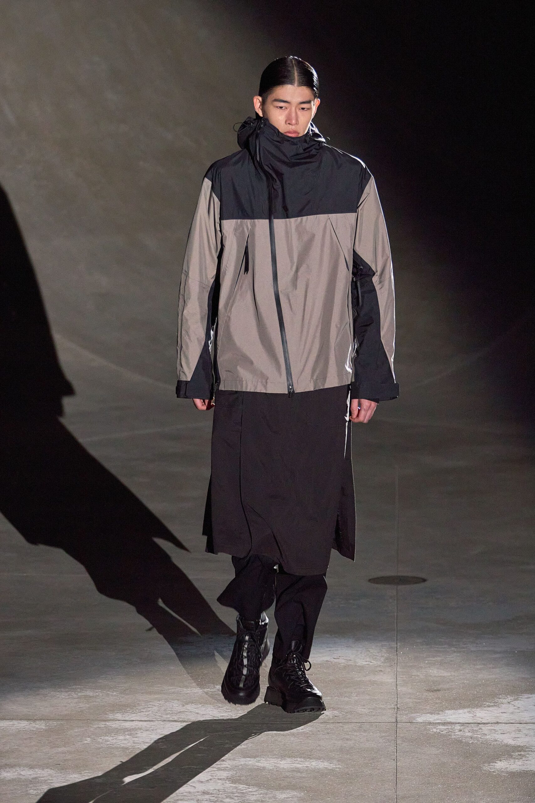 black gray relaxed coat with pants and boots