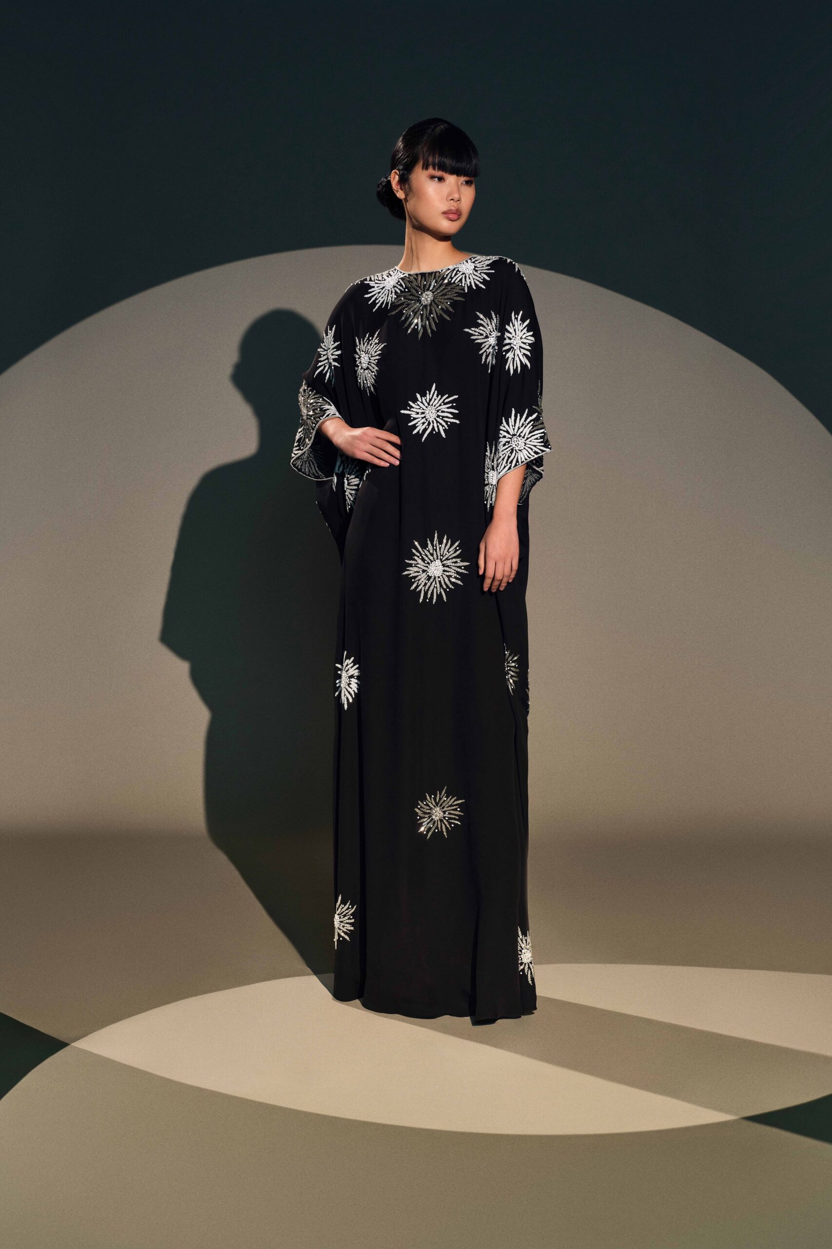 black embroidered silk gown