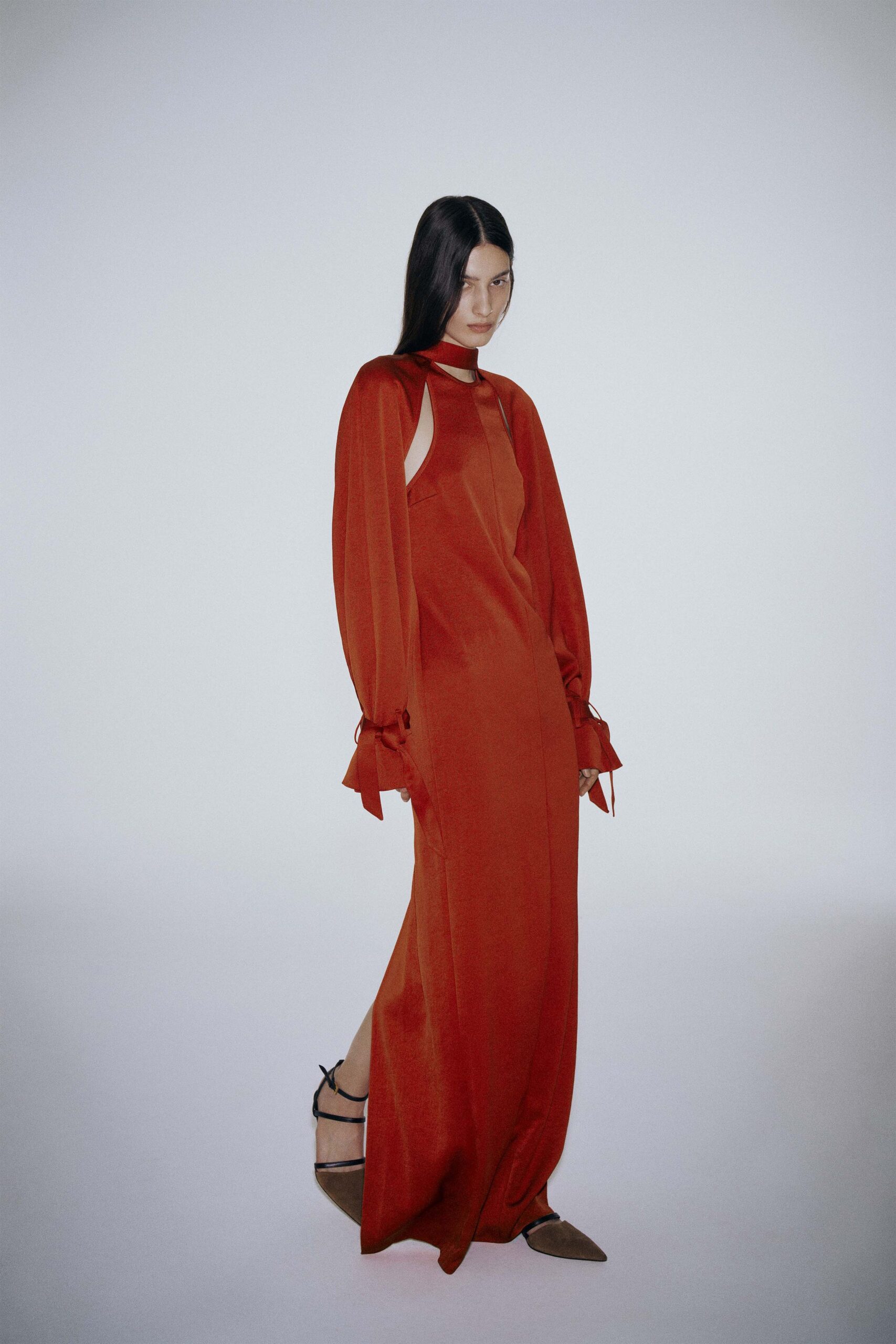 red silk long-sleeve high-neck fitted draped maxi gown