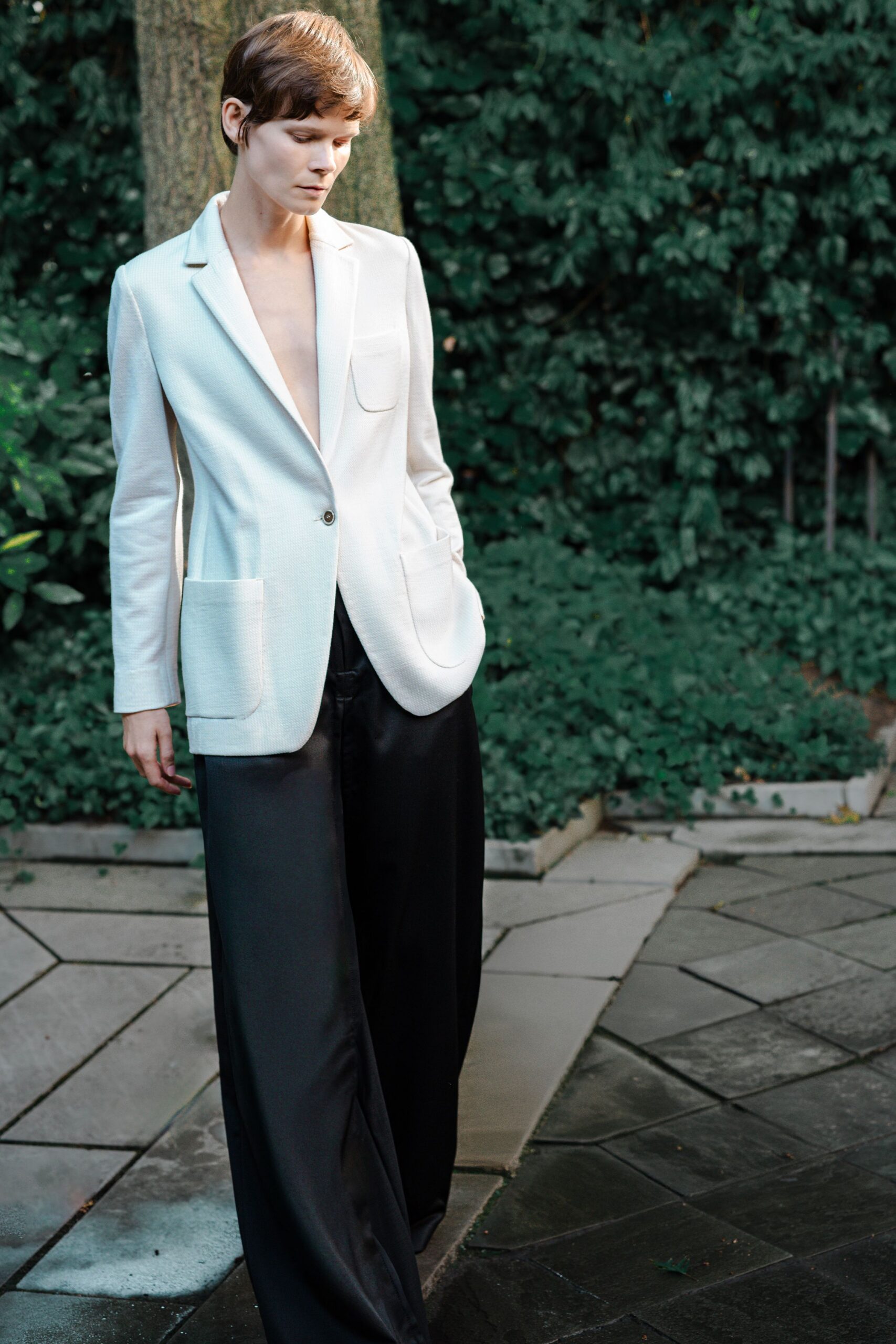 white tailored blazer black wide-leg pants