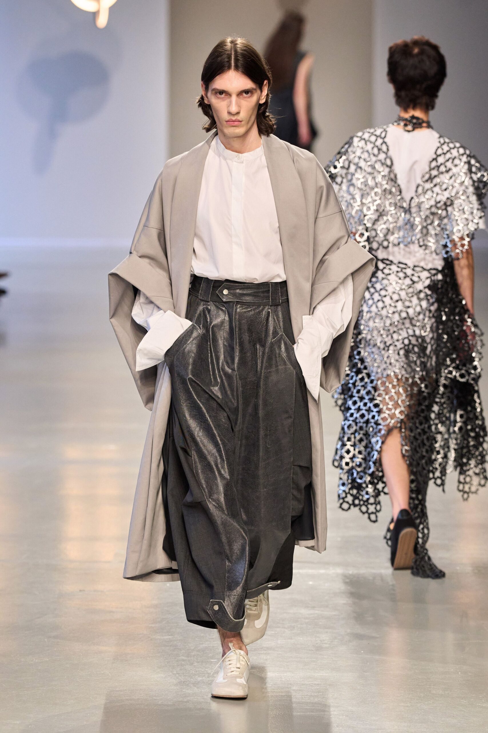 gray coat with black pants