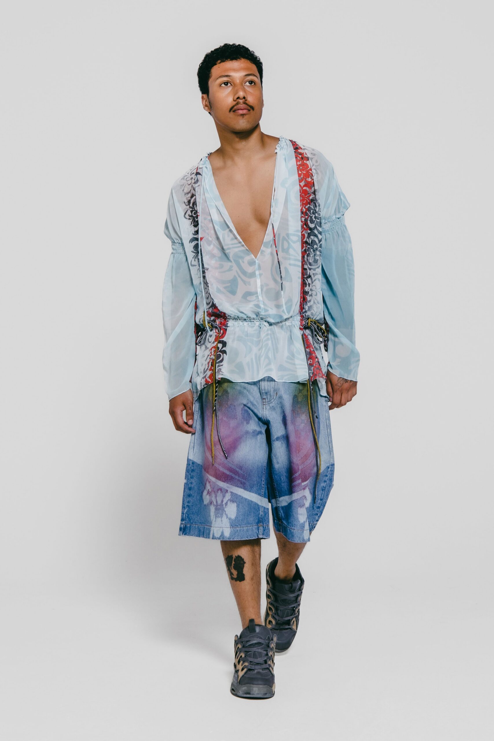 blue relaxed shirt with denim shorts