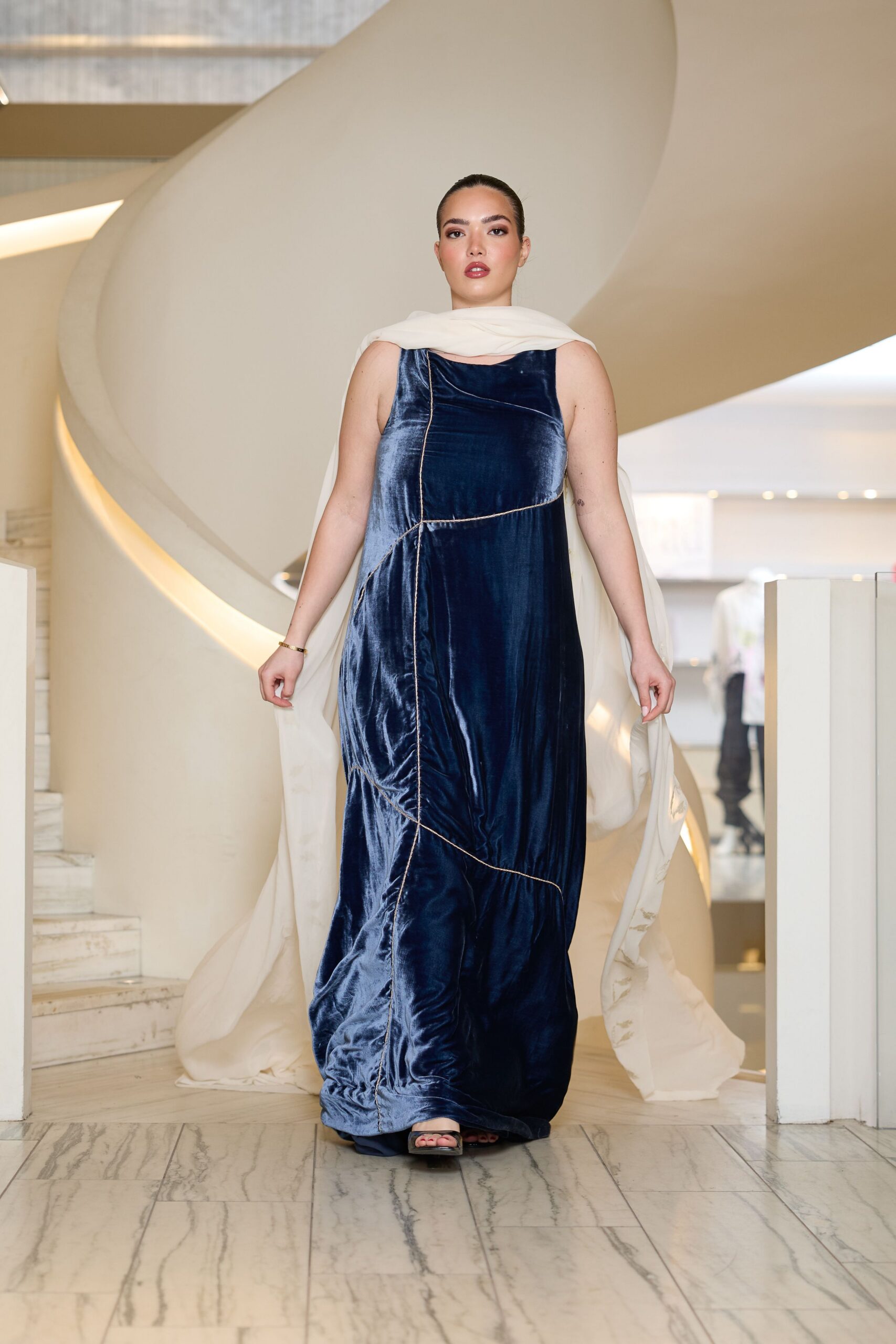 blue velvet gown with white cape