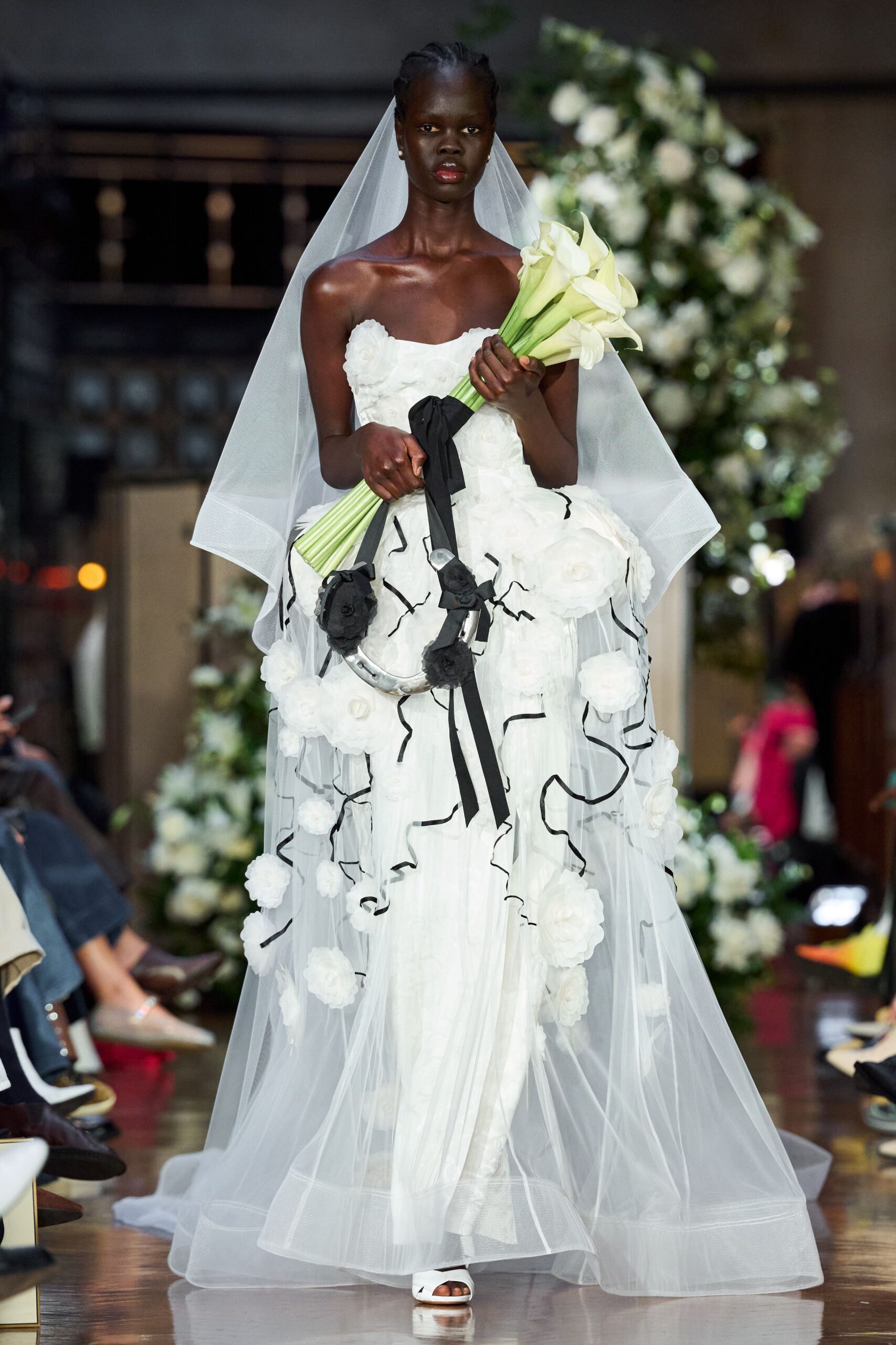 white silk strapless fitted floral layered flowing gown