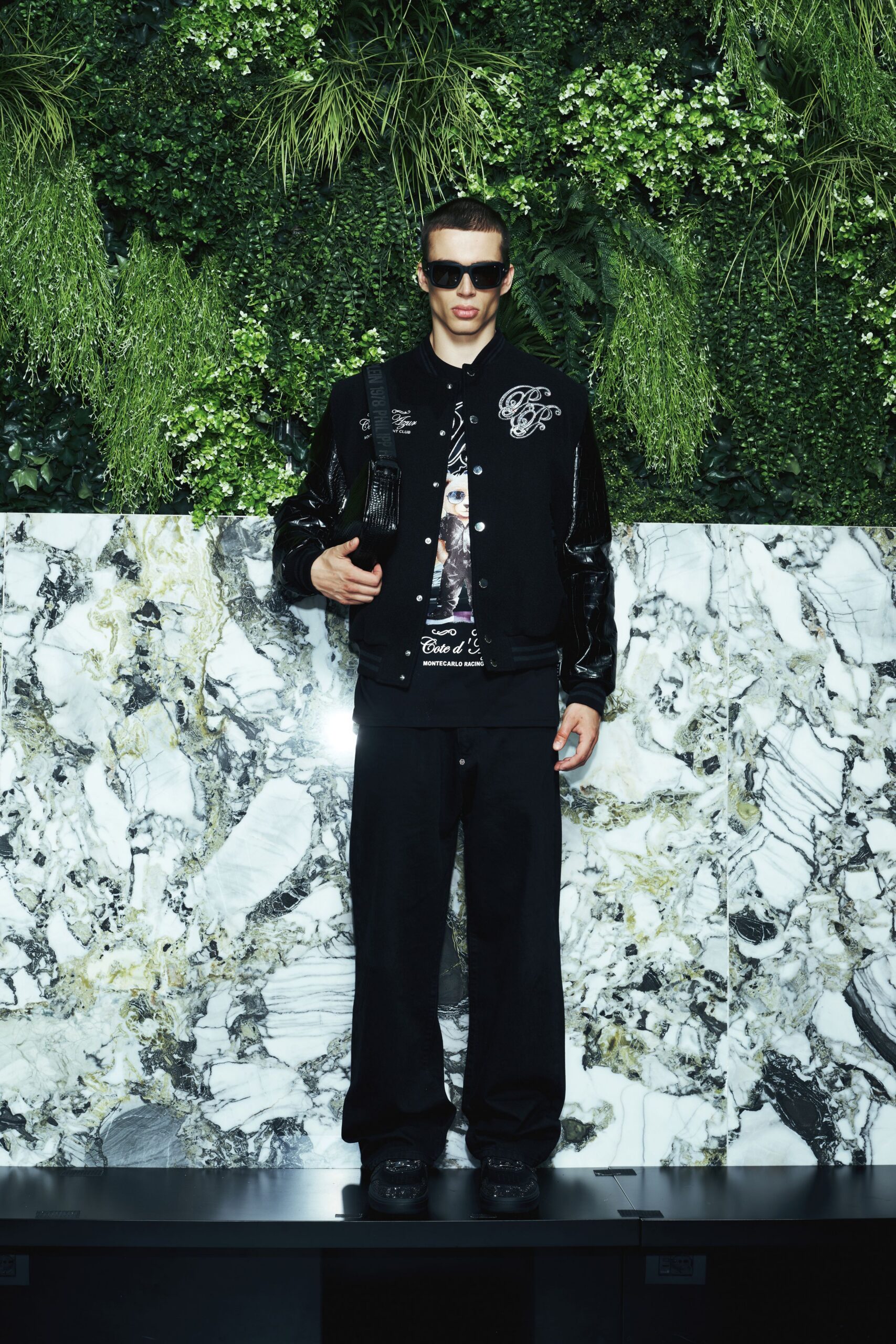 black leather long-sleeve collared relaxed zippered embroidered jacket