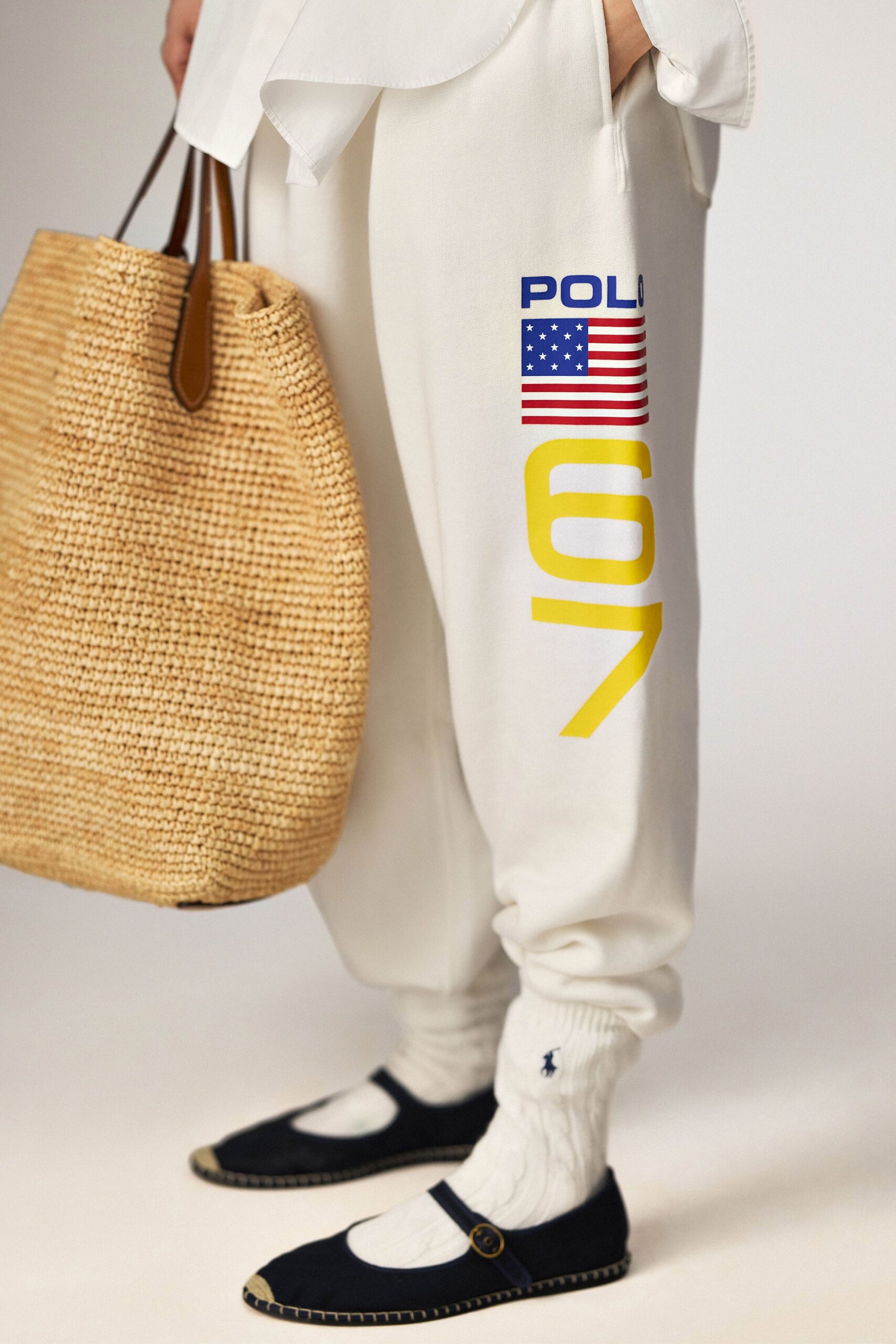 relaxed white pants with navy shoes
