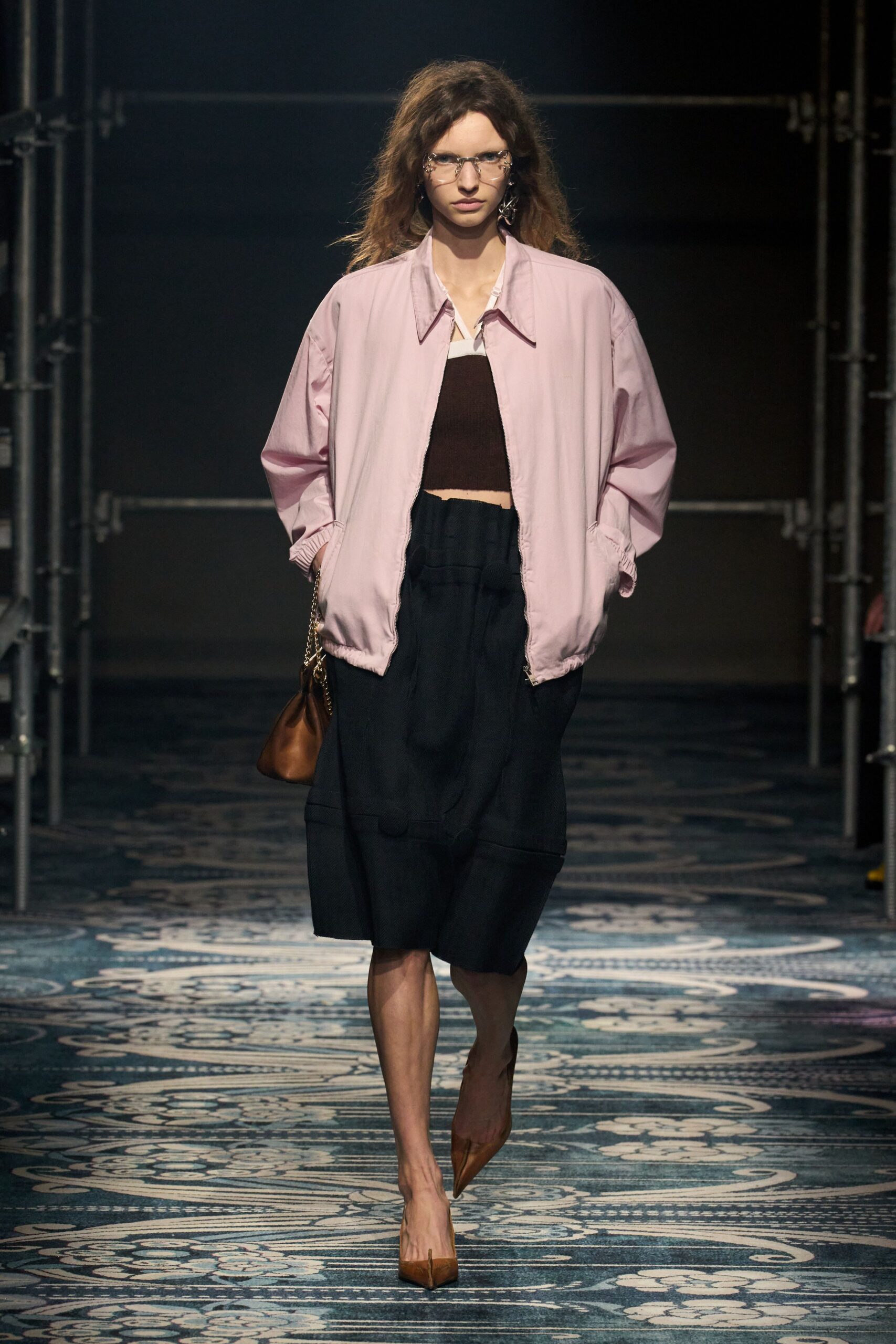 pink relaxed jacket with black skirt