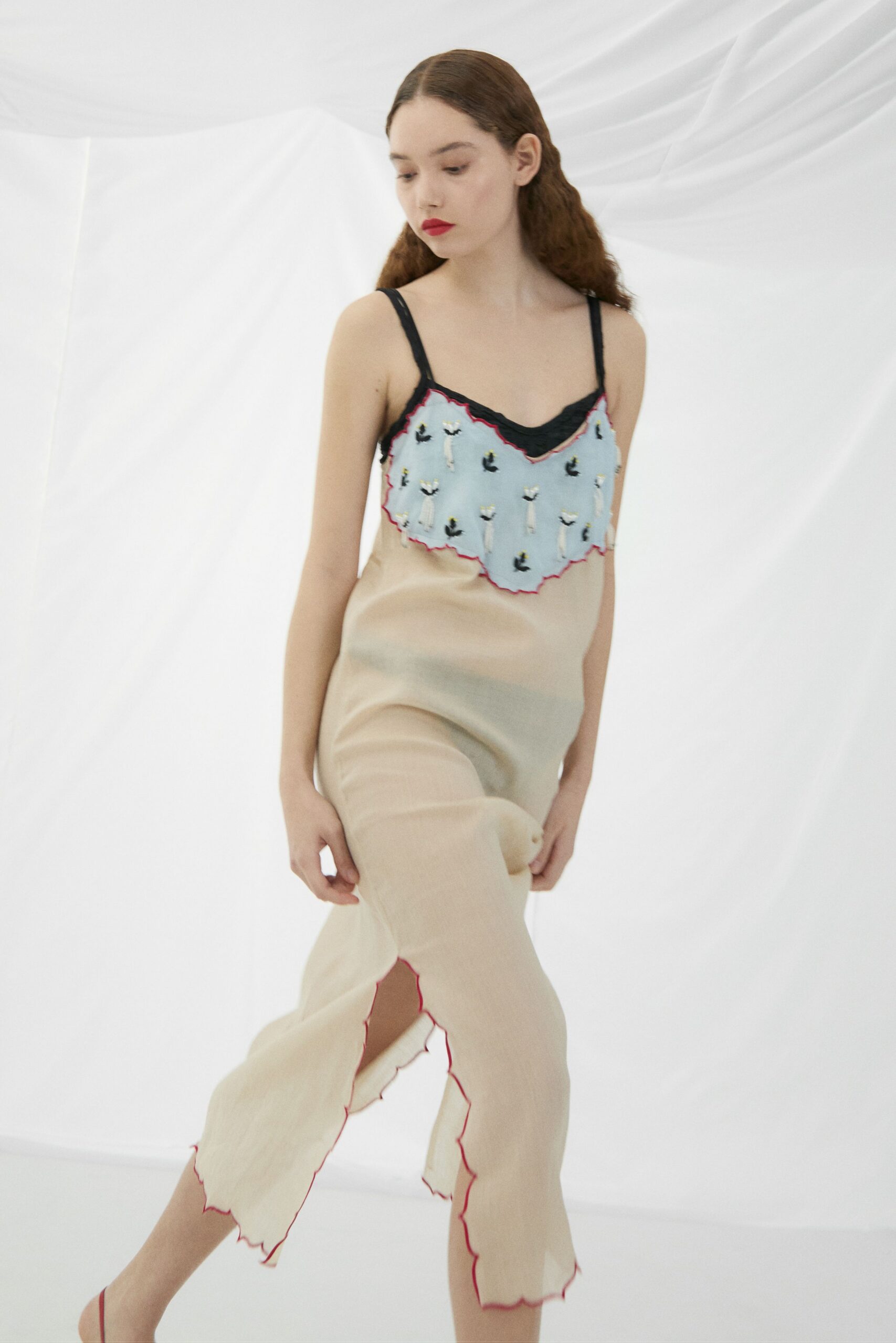 beige silk sleeveless v-neck fitted pleated embroidered dress