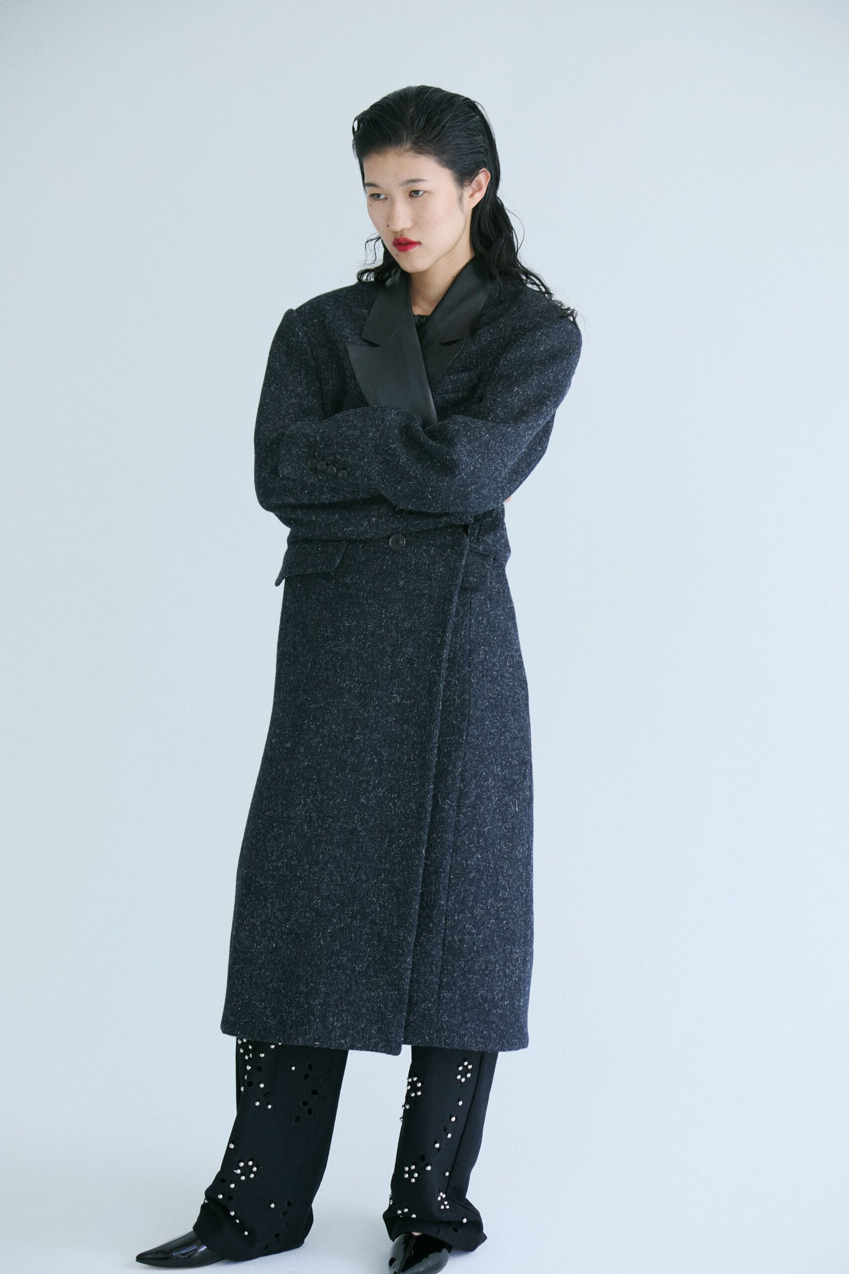 black wool long-sleeve collared fitted buttoned layered coat