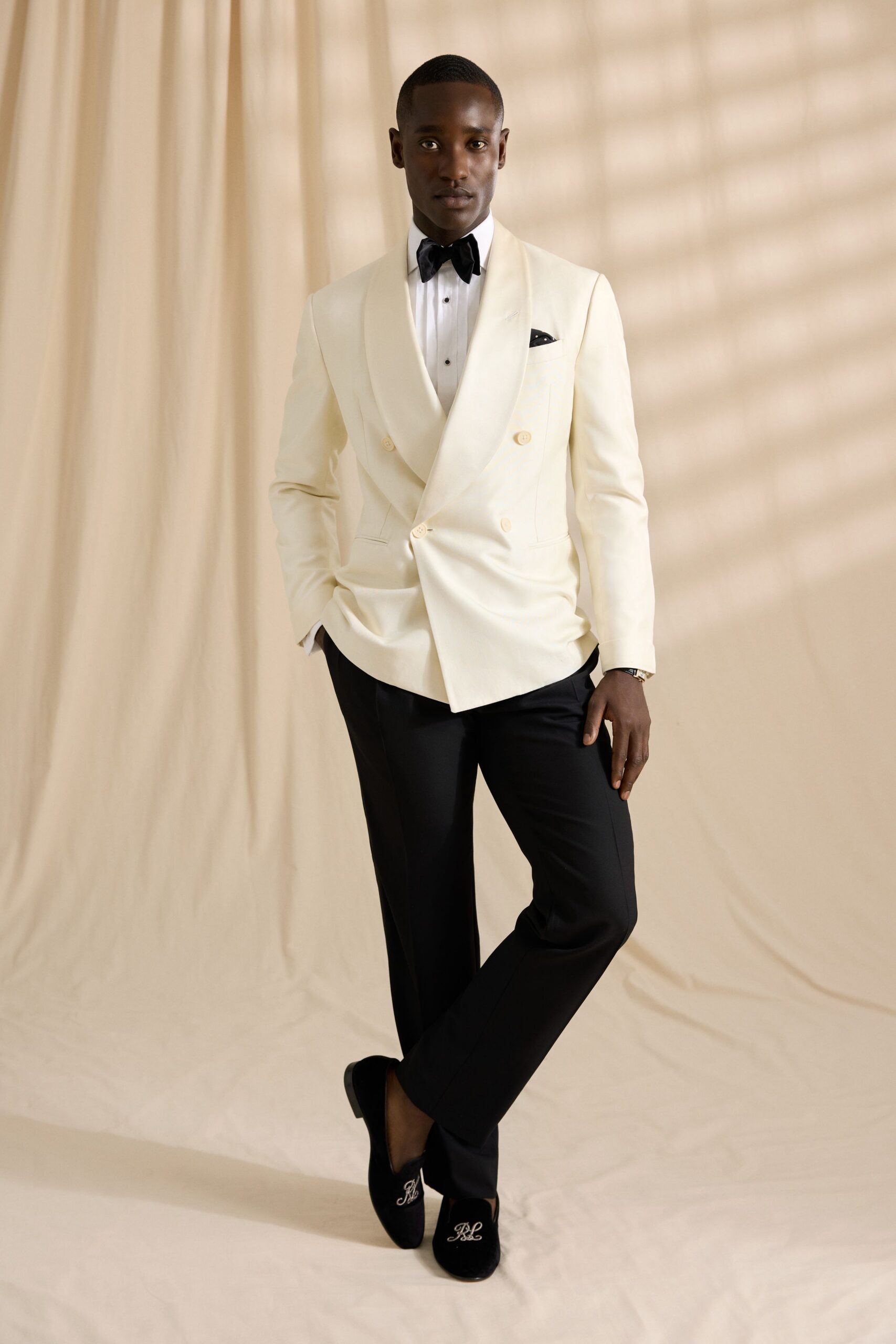 white tailored blazer black pants