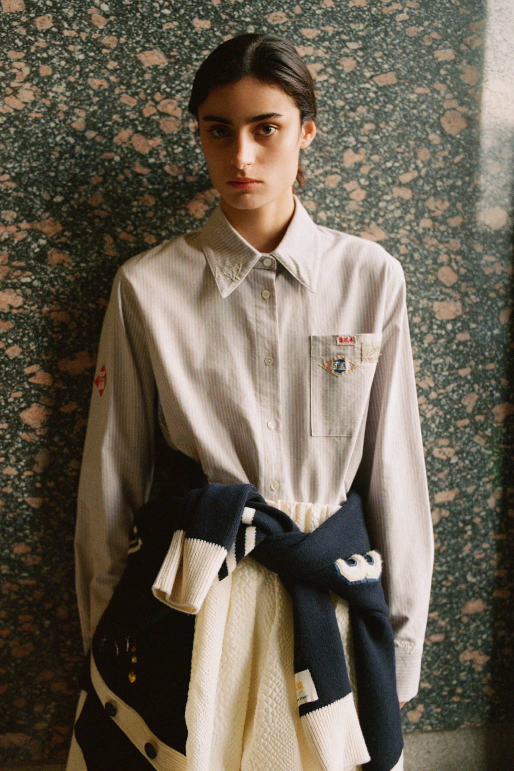 relaxed white striped shirt with pleated skirt