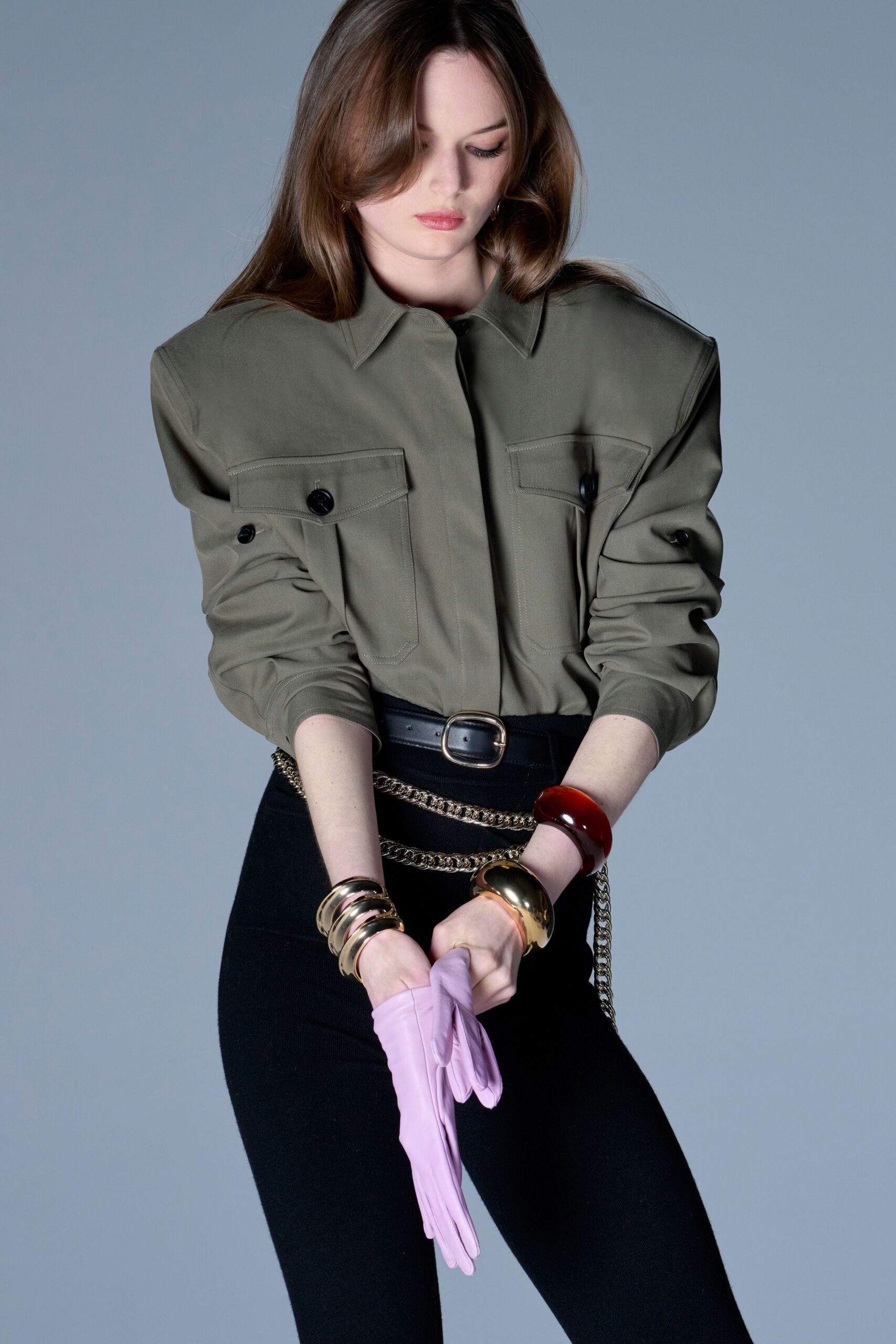 green relaxed shirt with black pants