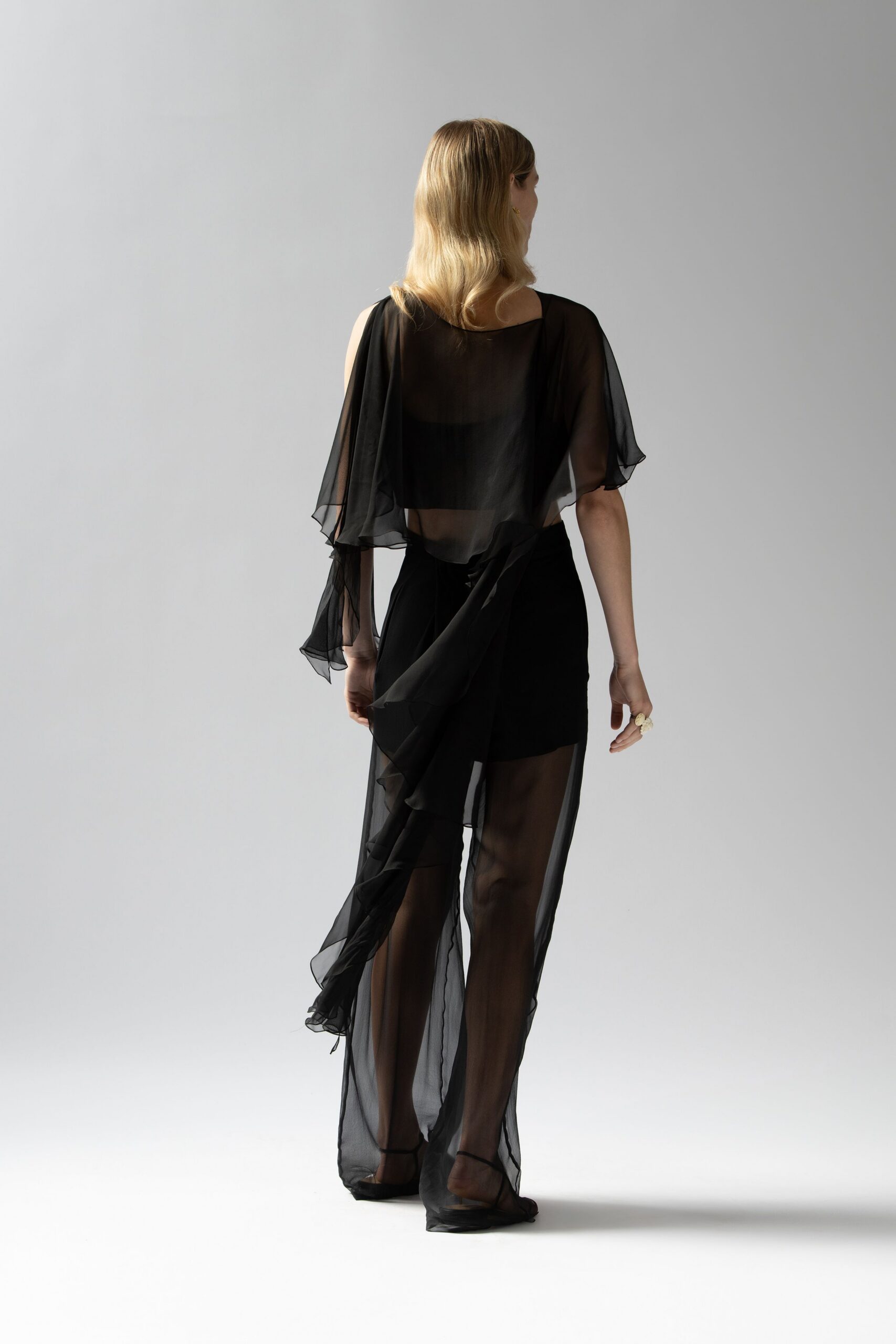 black chiffon sleeveless high-neck fitted layered flowing dress
