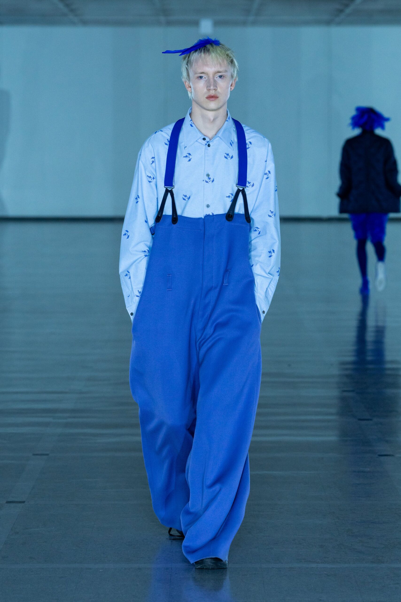 blue shirt and overalls