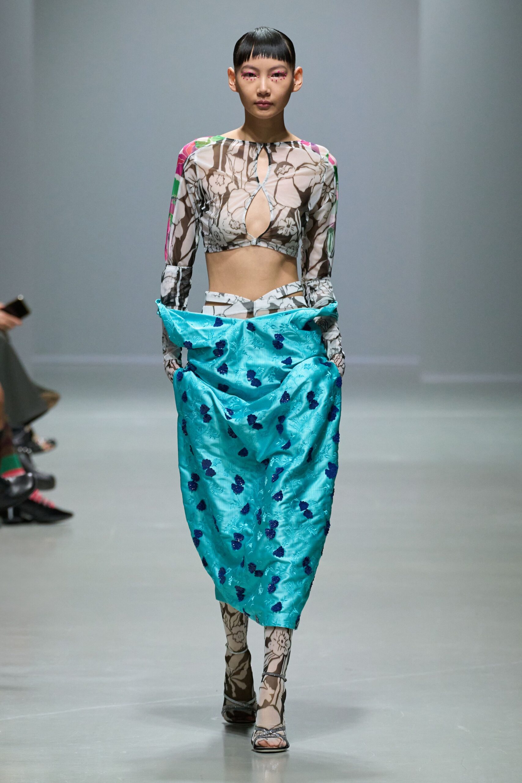 multi-colored fitted top with blue skirt
