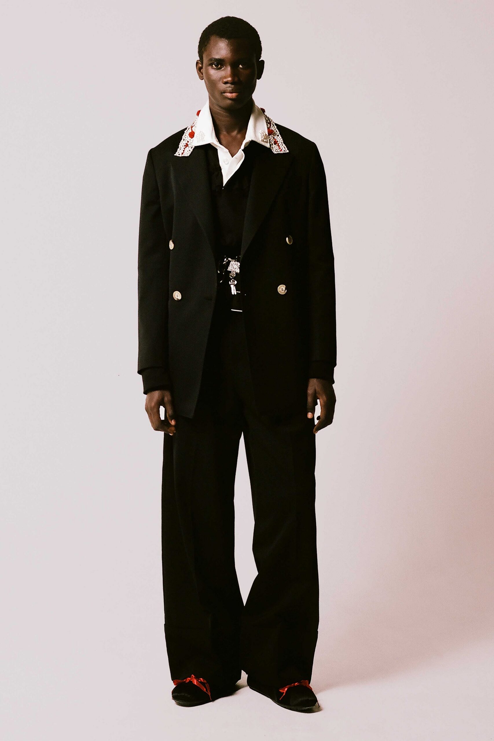 black long-sleeve collared structured embroidered blazer