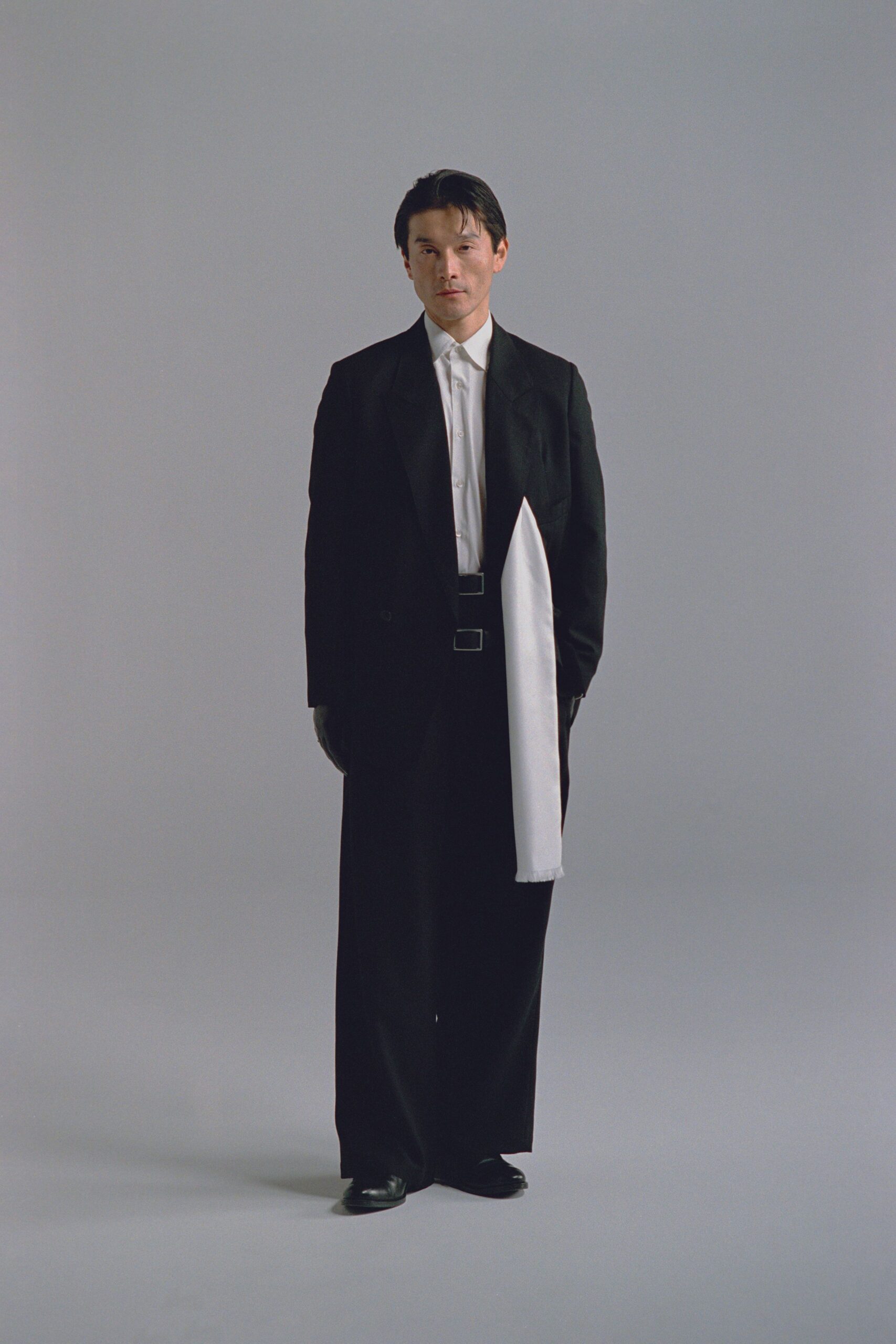 black tailored suit with white shirt