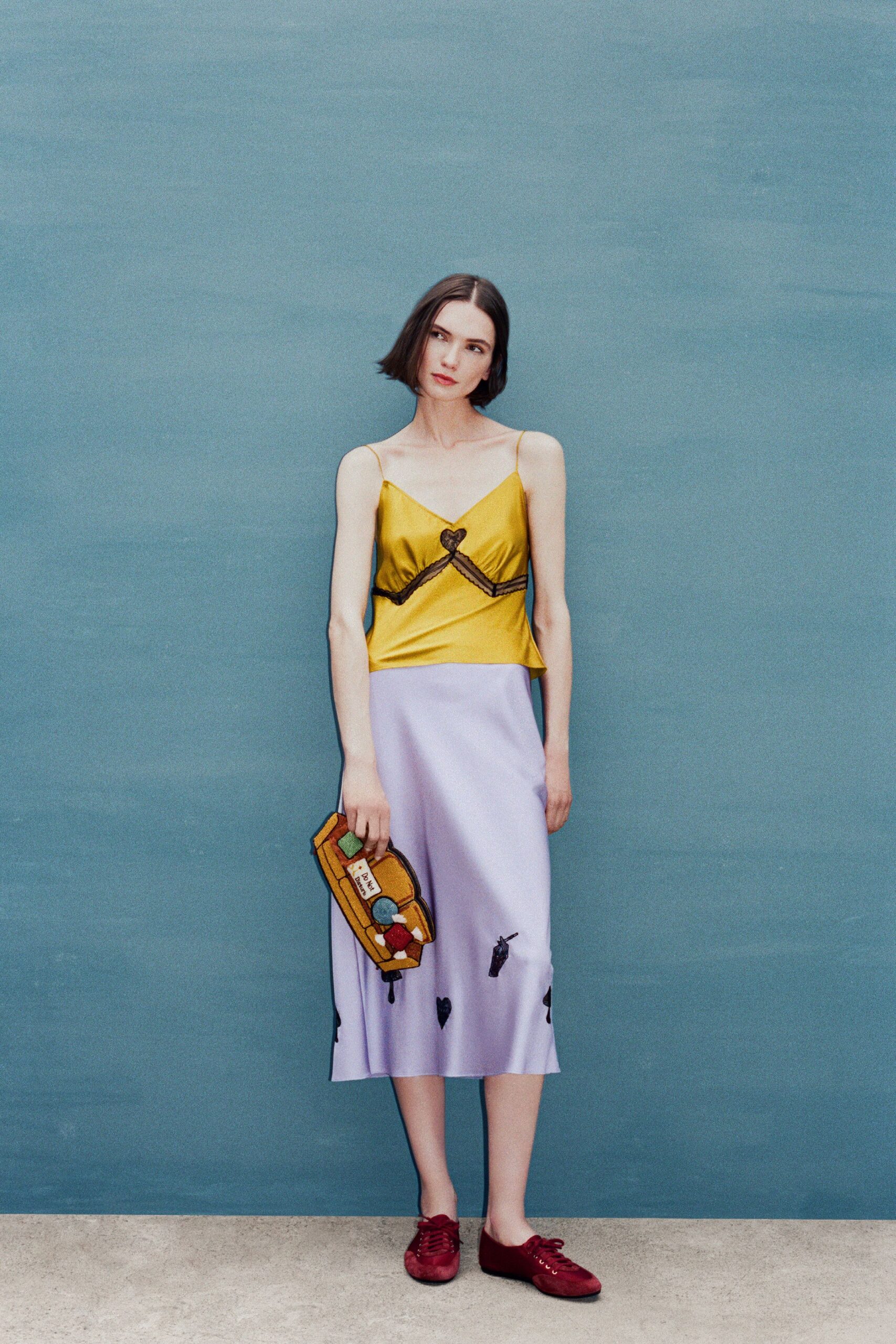 yellow silk sleeveless v-neck fitted top