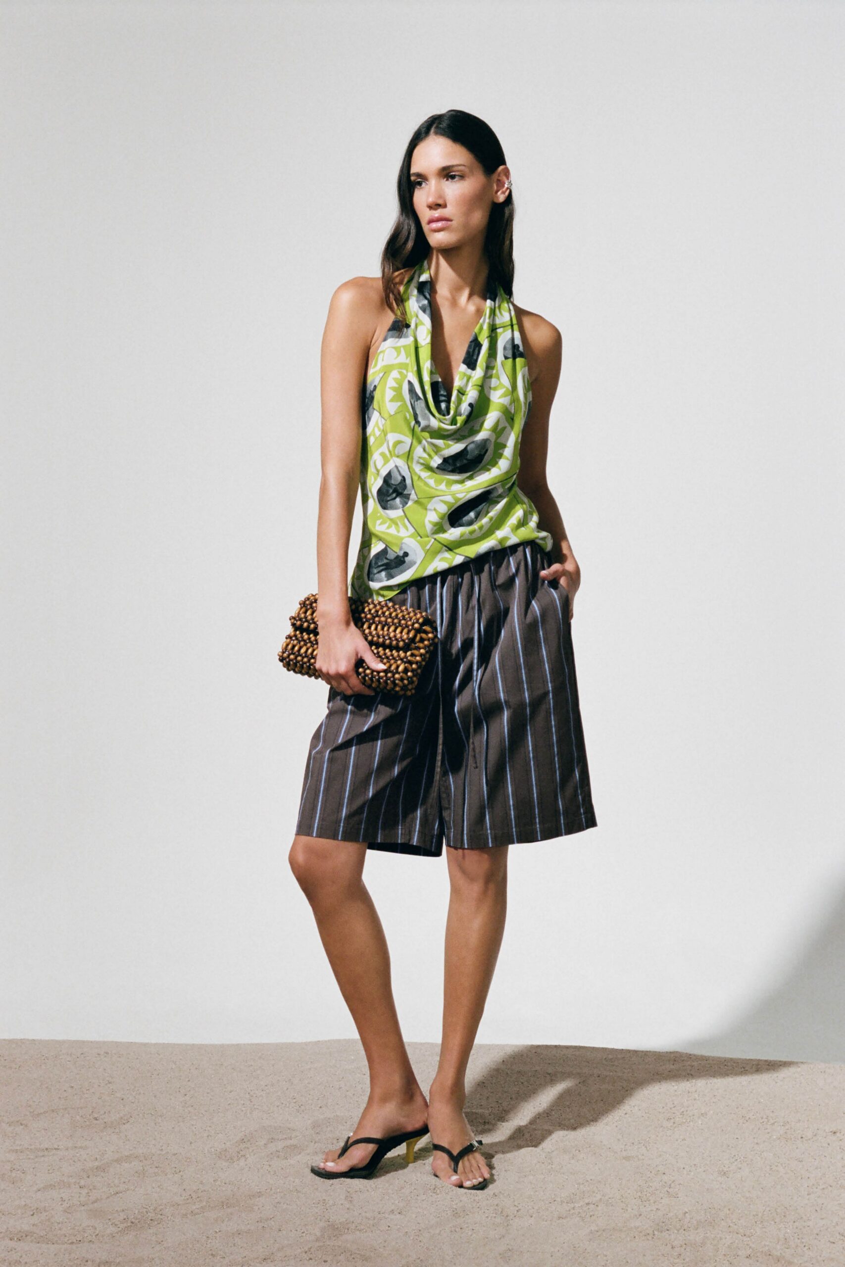 green silk sleeveless v-neck relaxed printed top