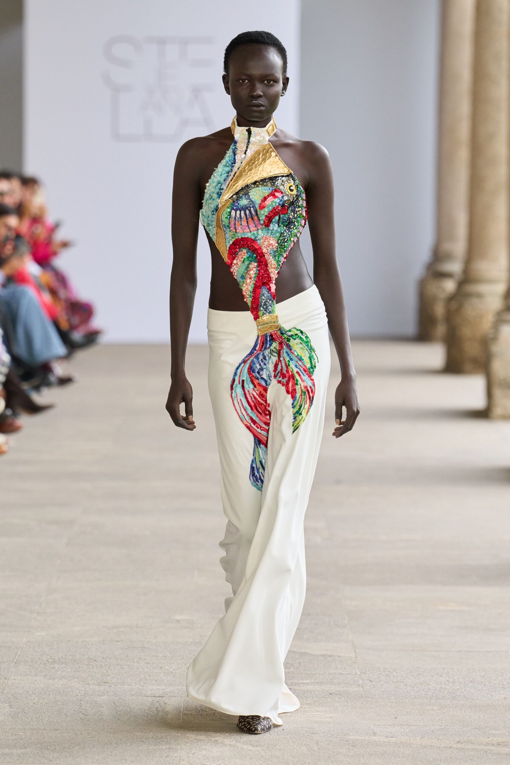 white multi-colored embellished gown