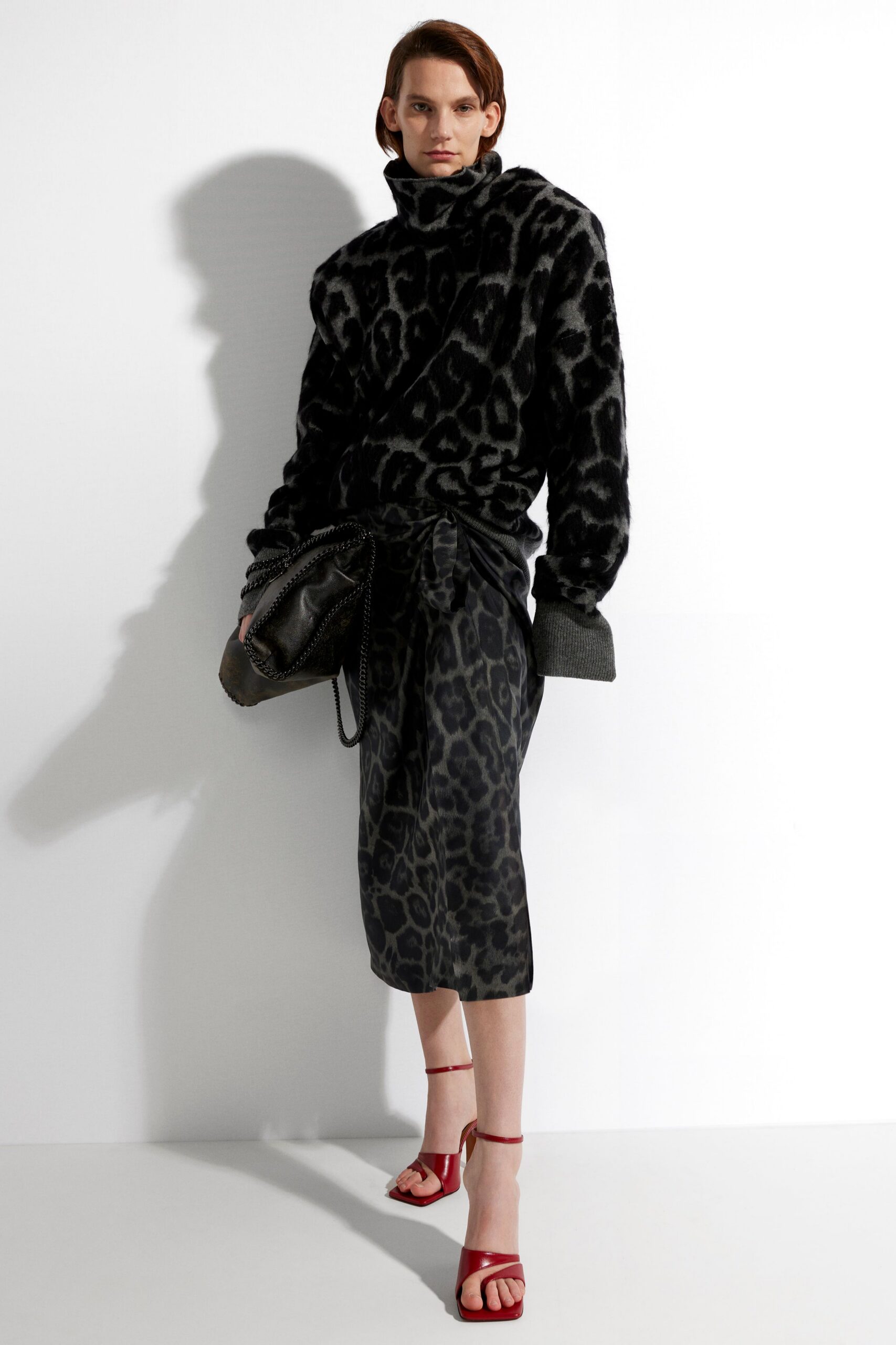 black faux-fur sweater and pencil skirt