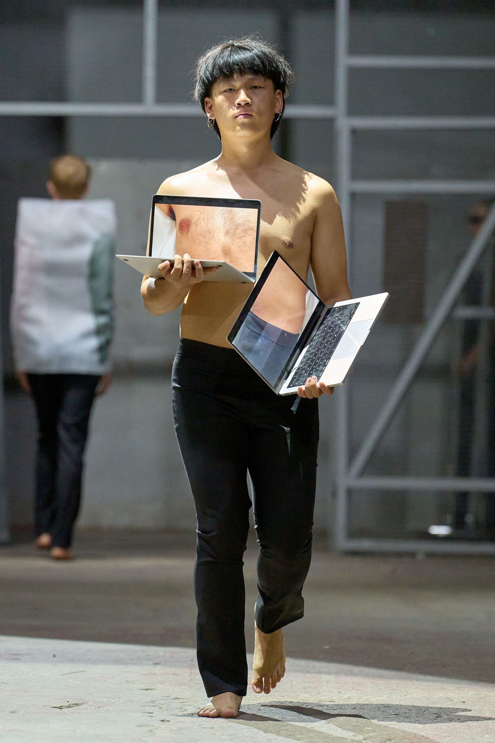 black fitted pants with bare feet