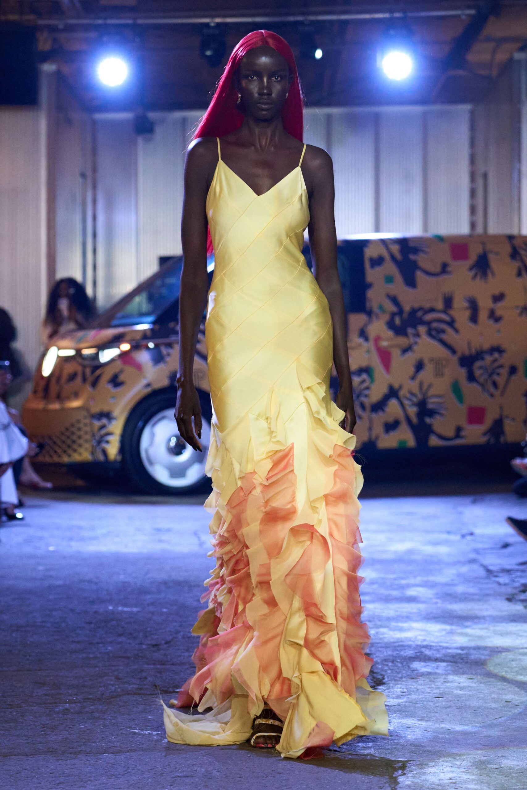 yellow silk sleeveless v-neck fitted ruffled tiered gown