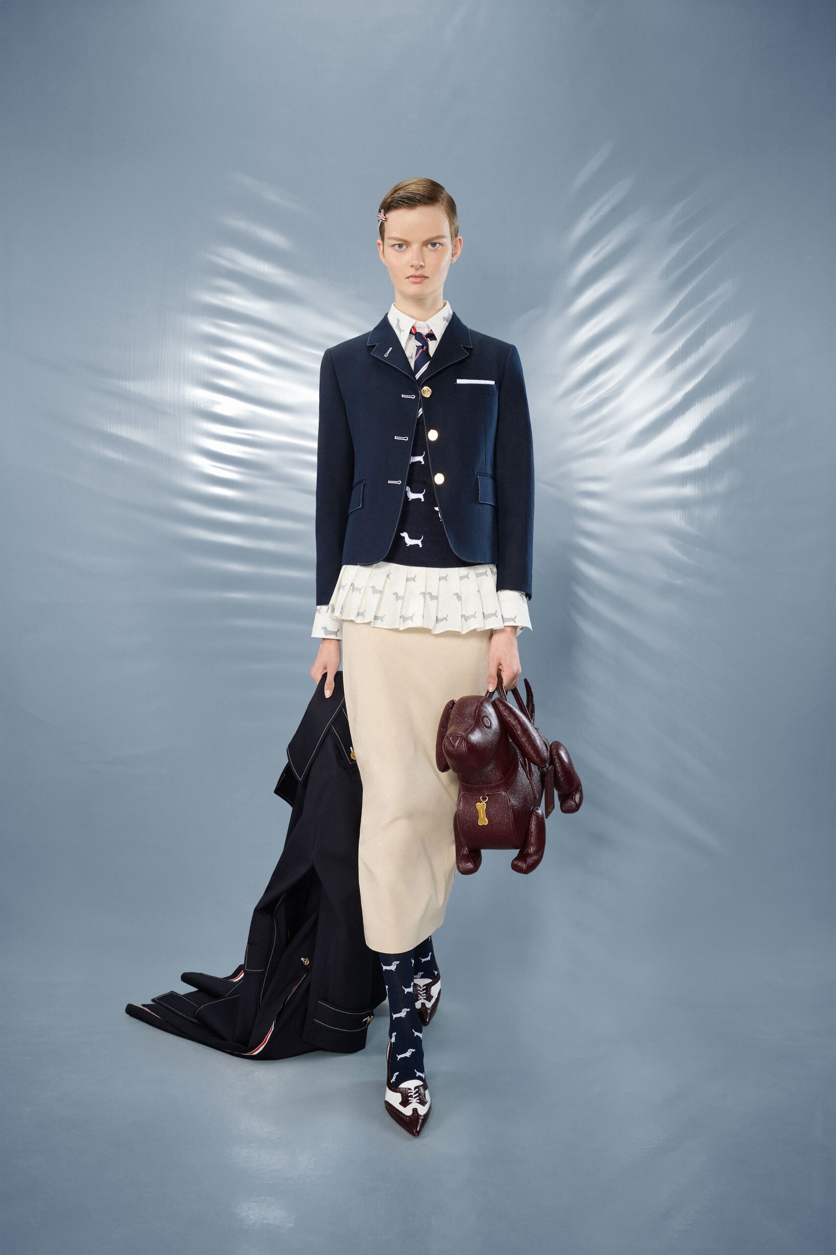 navy blazer with ruffled blouse