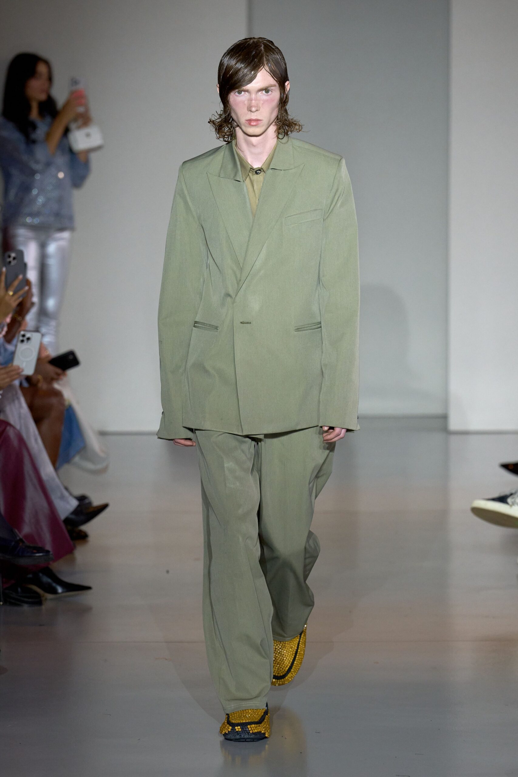 green relaxed suit with yellow shoes