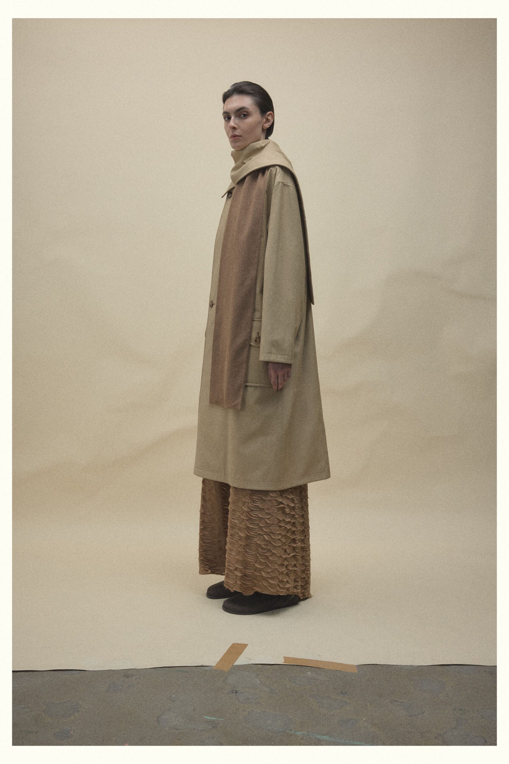 beige coat brown pleated pants