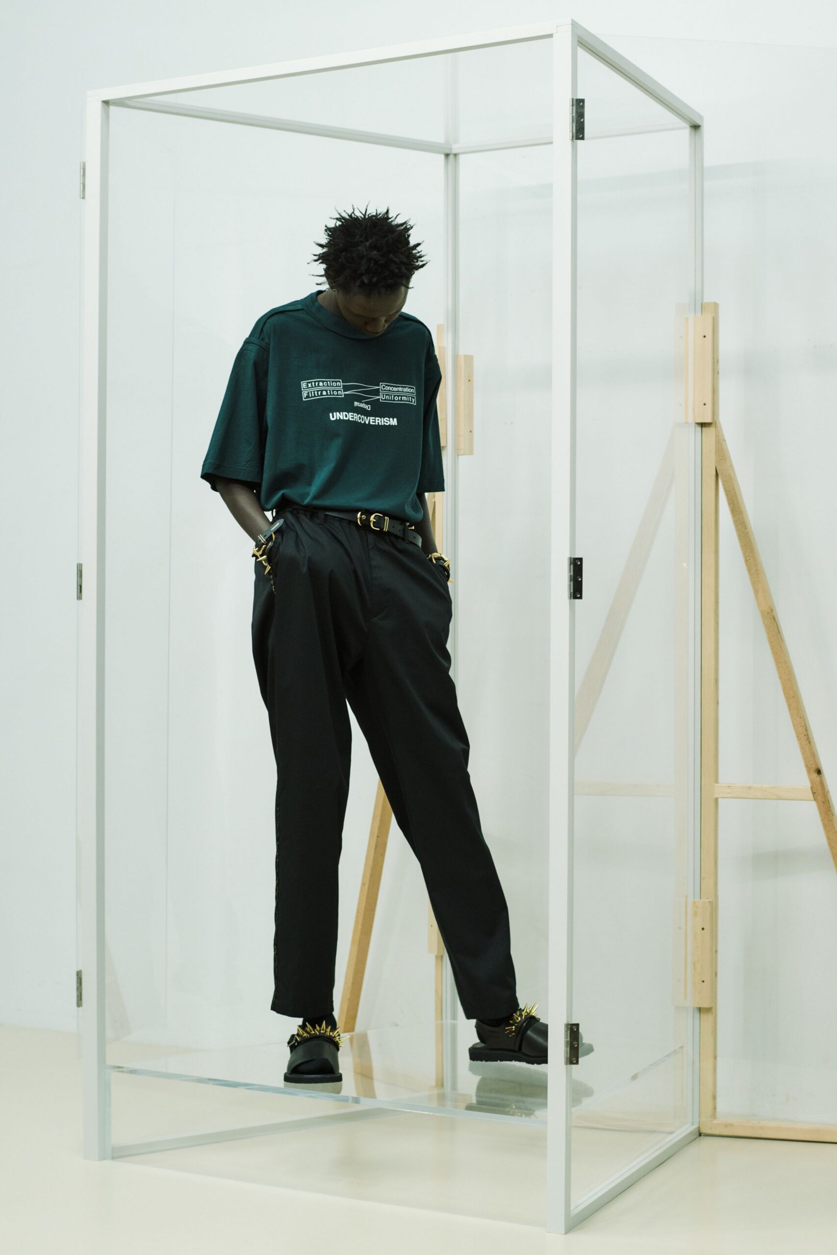 green printed t-shirt black pants