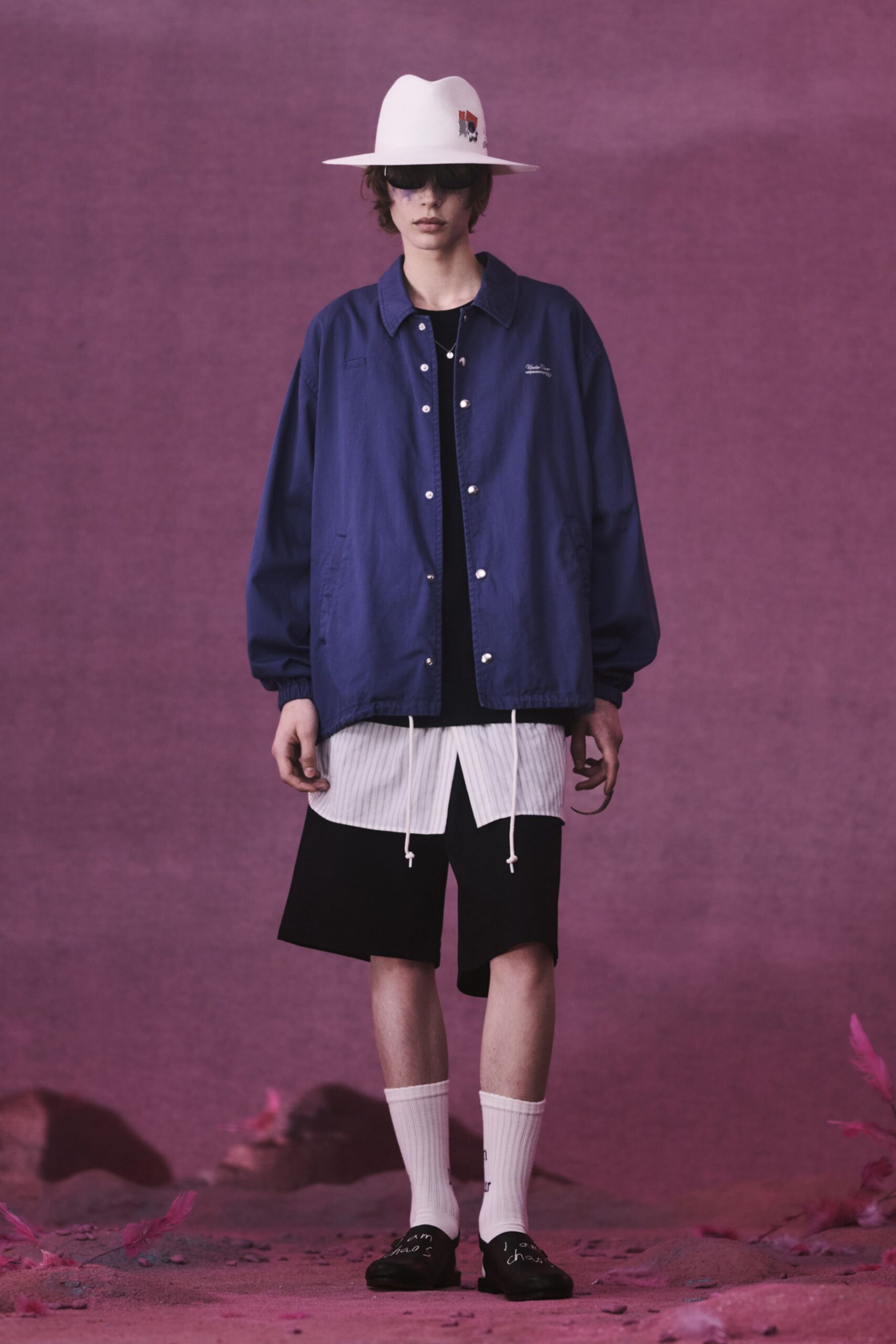 blue relaxed jacket with black shorts