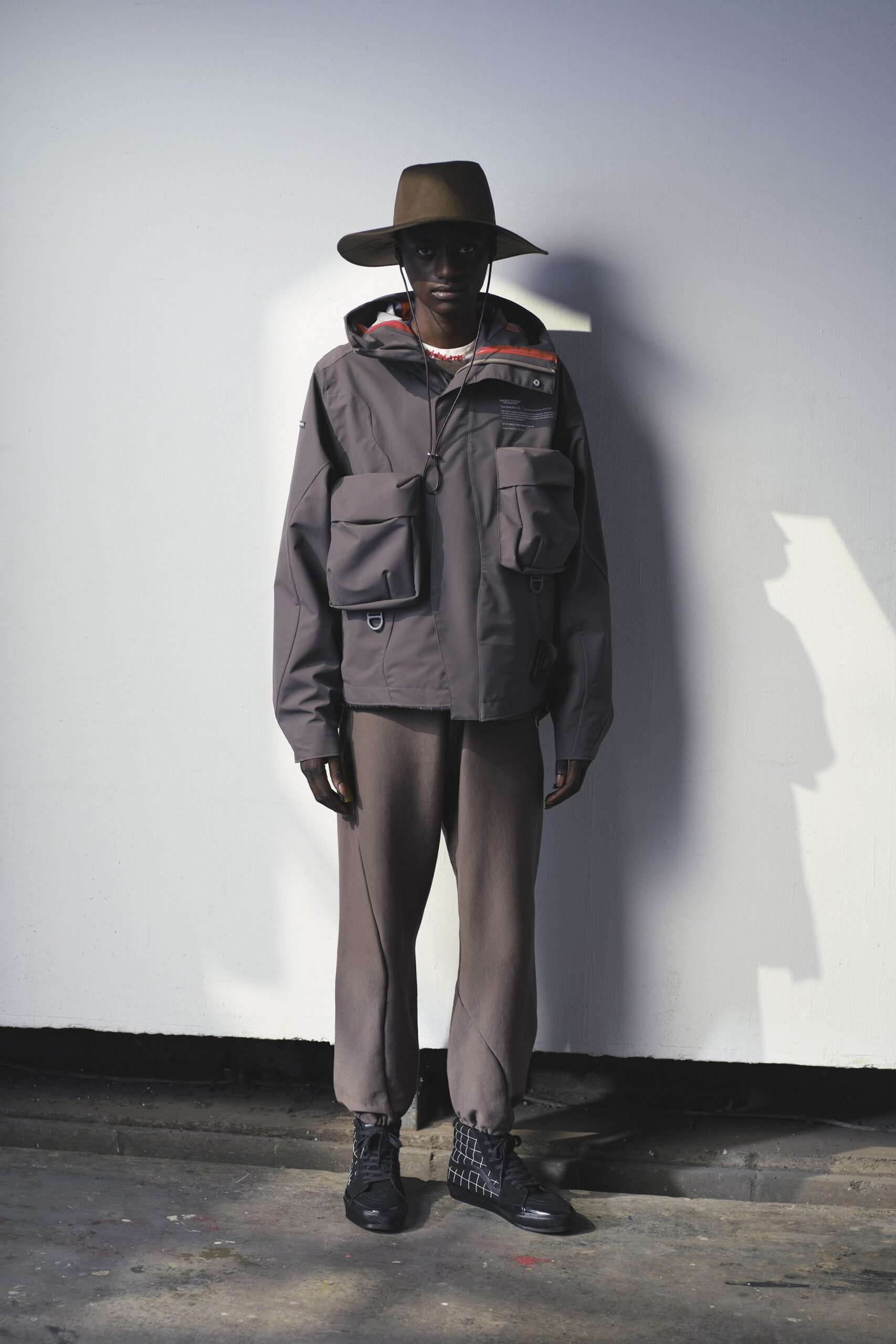 gray relaxed jacket with beige pants