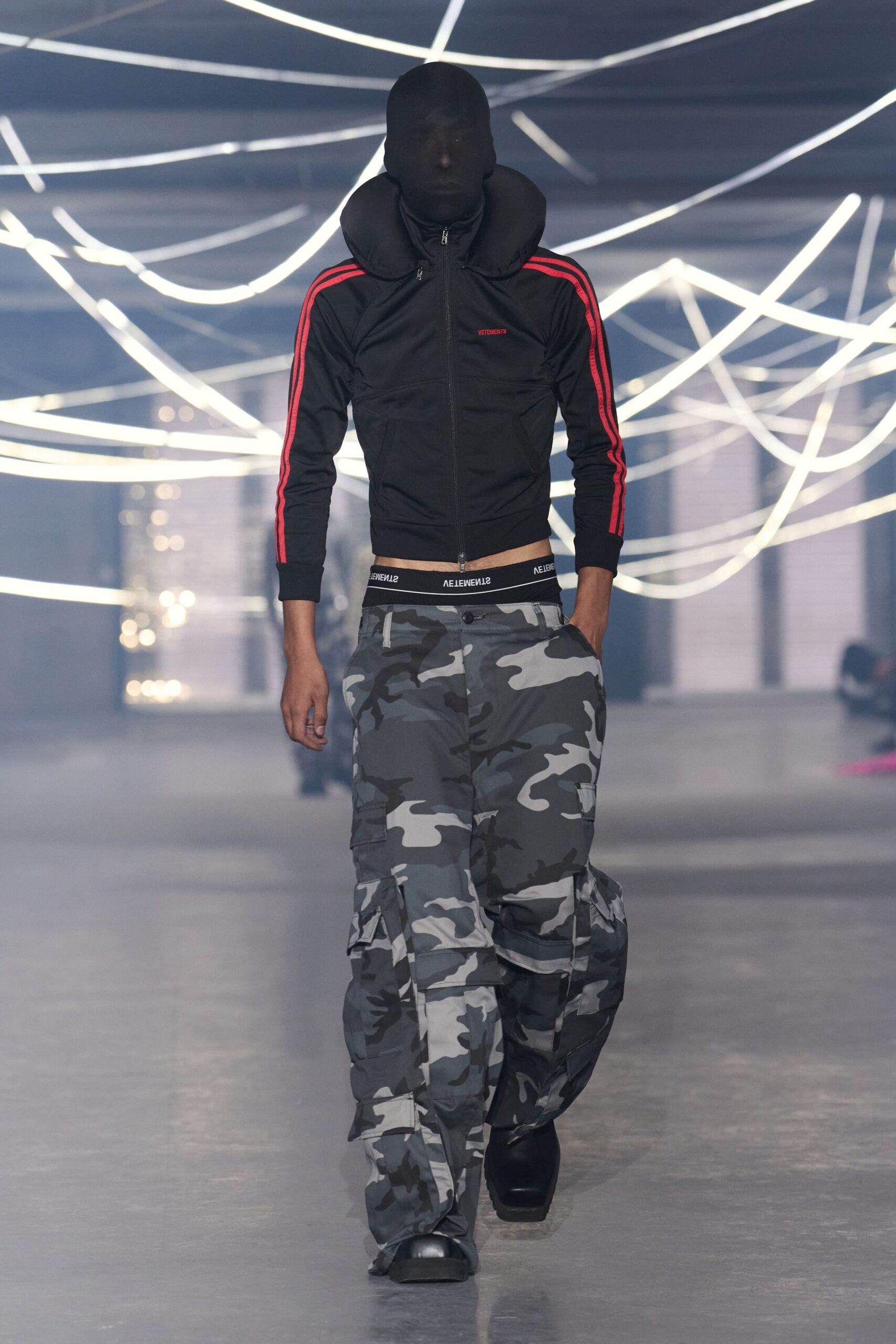 black fitted jacket with cargo pants