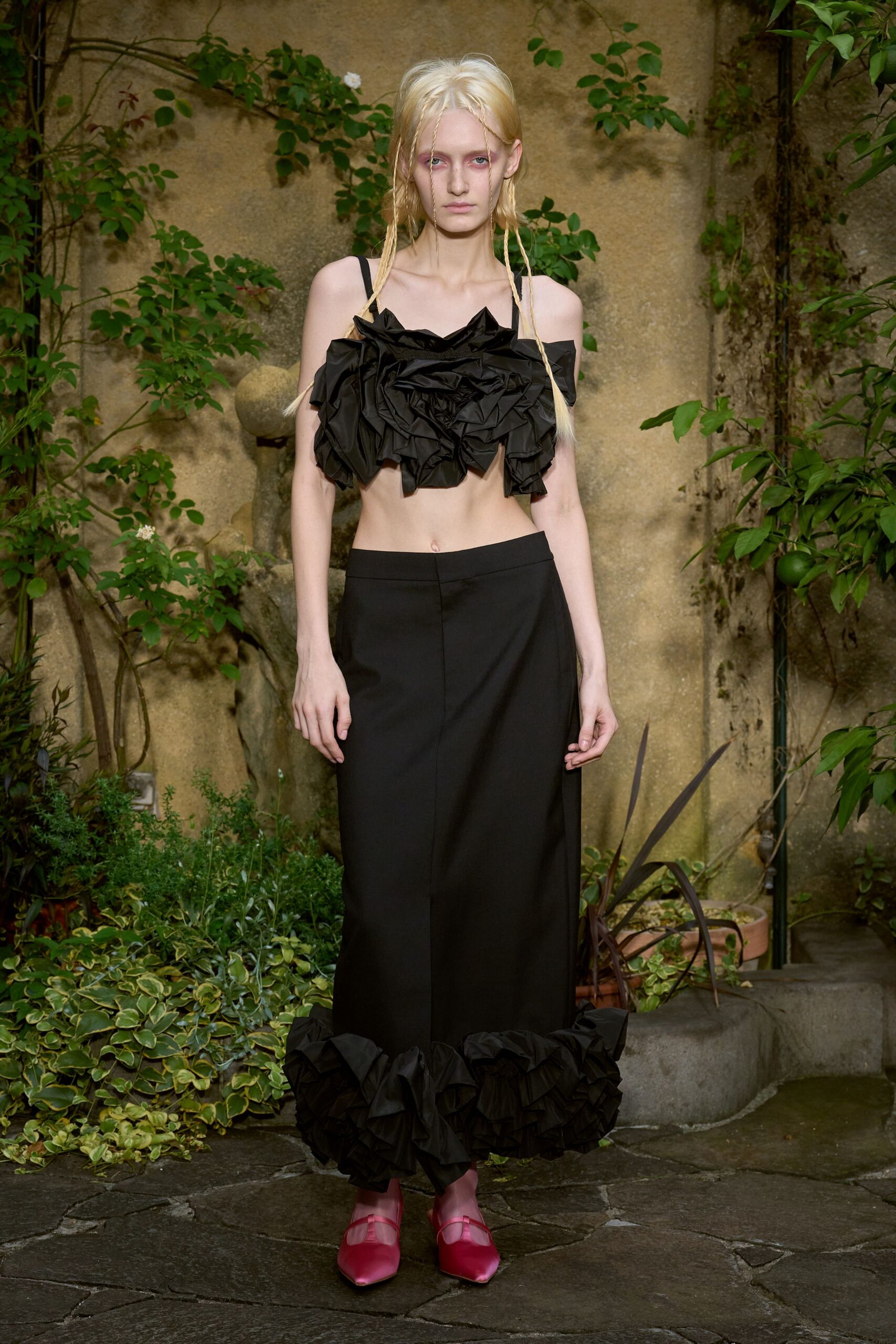 black ruffled top and skirt