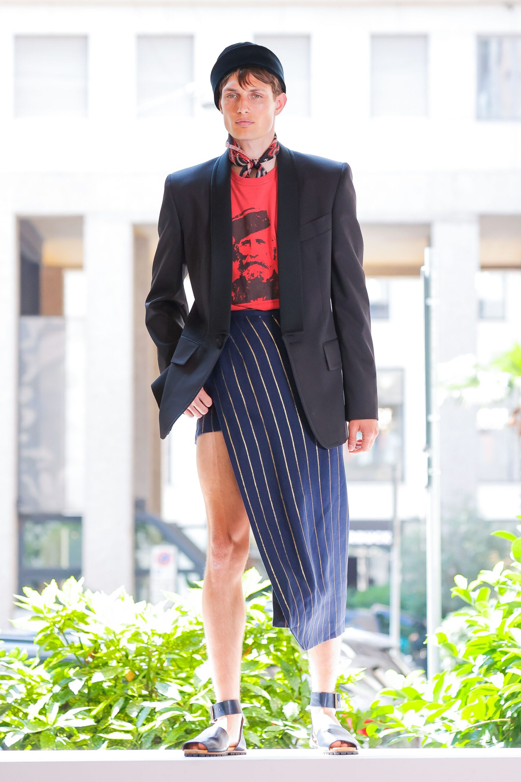 black blazer red top blue skirt