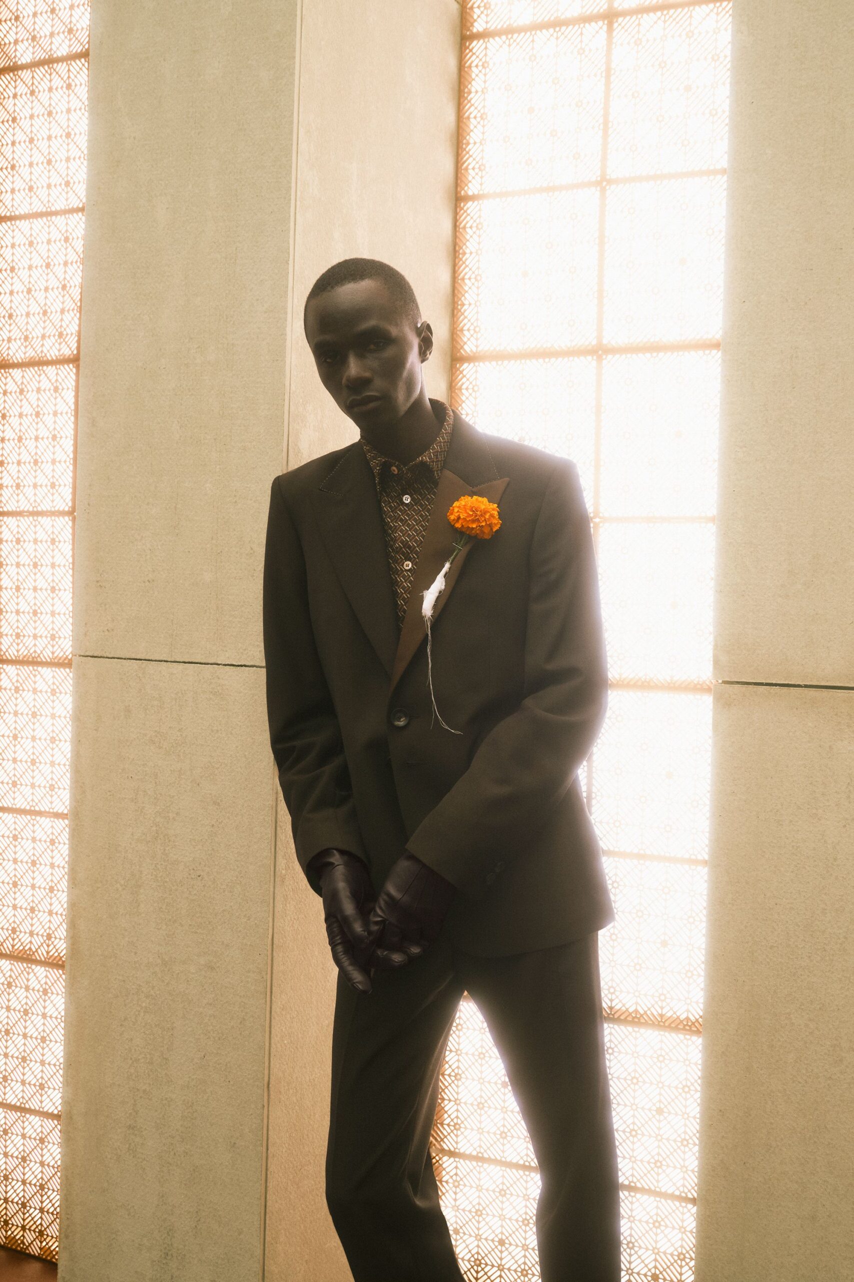 black wool long-sleeve collared tailored buttoned suit