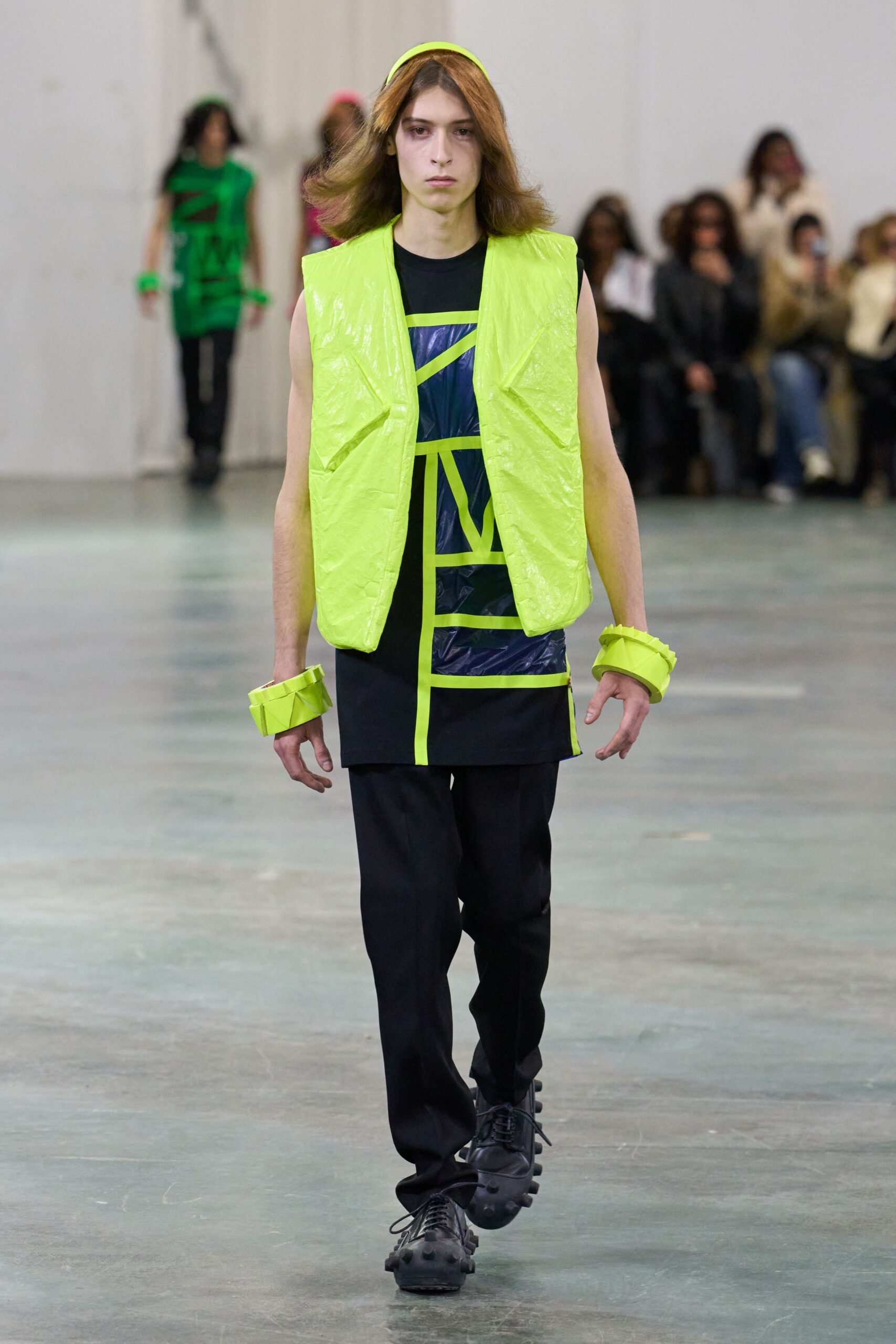green vinyl sleeveless relaxed vest
