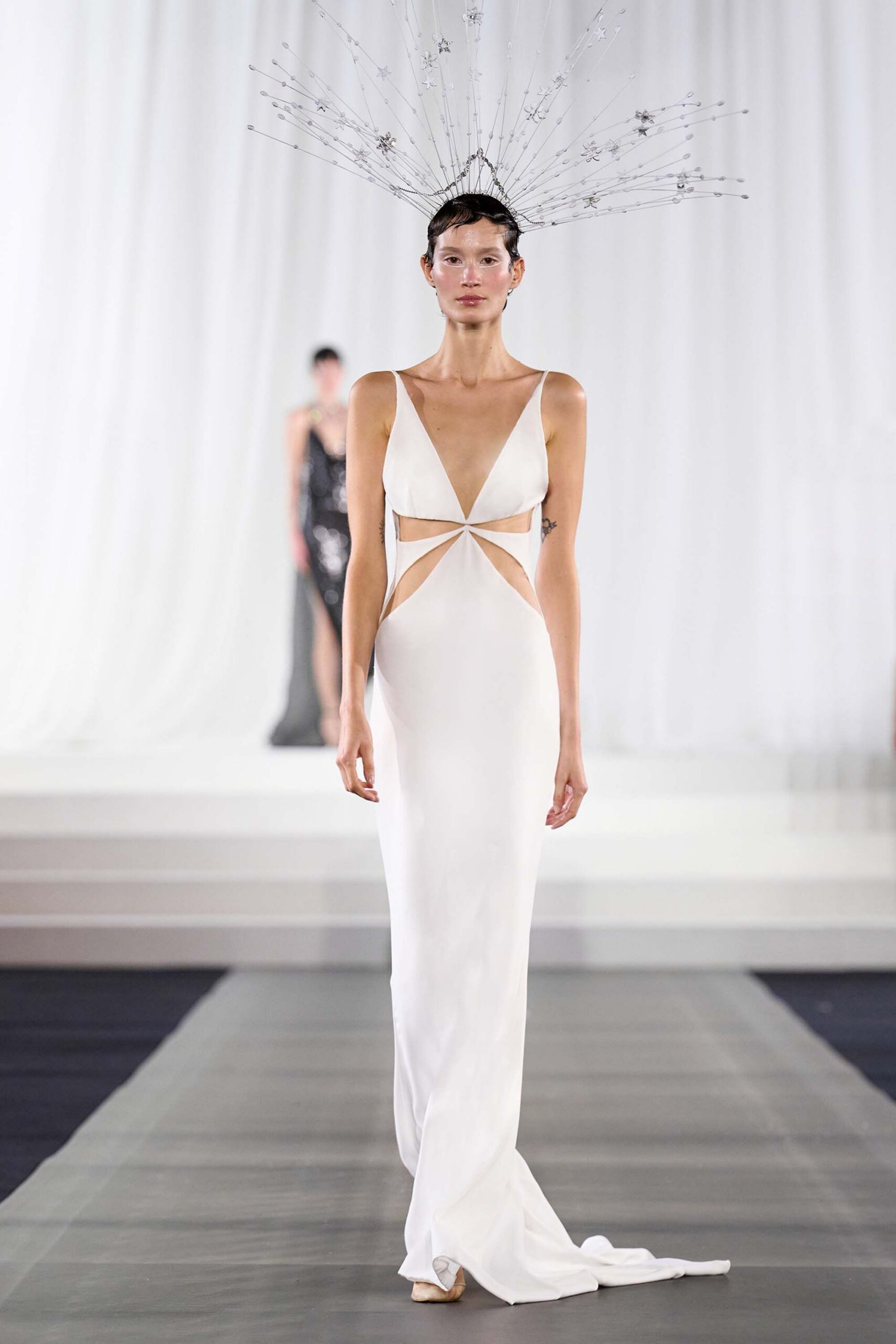 white fitted gown with cutouts