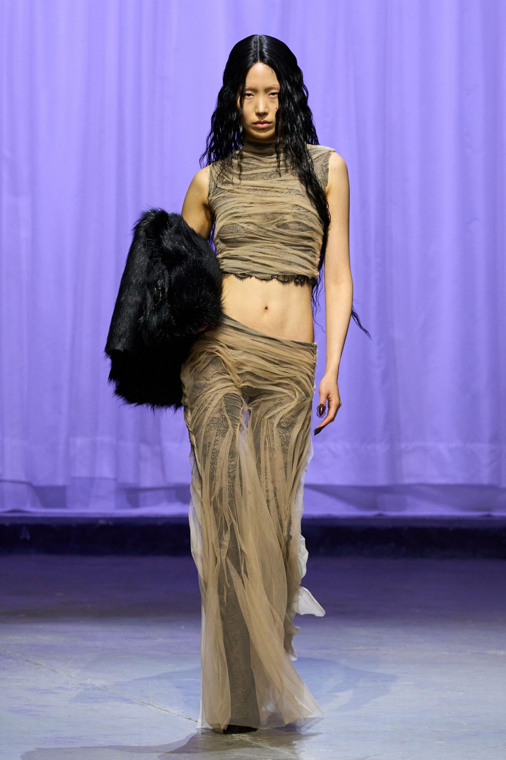beige silk top and gown with black faux-fur coat