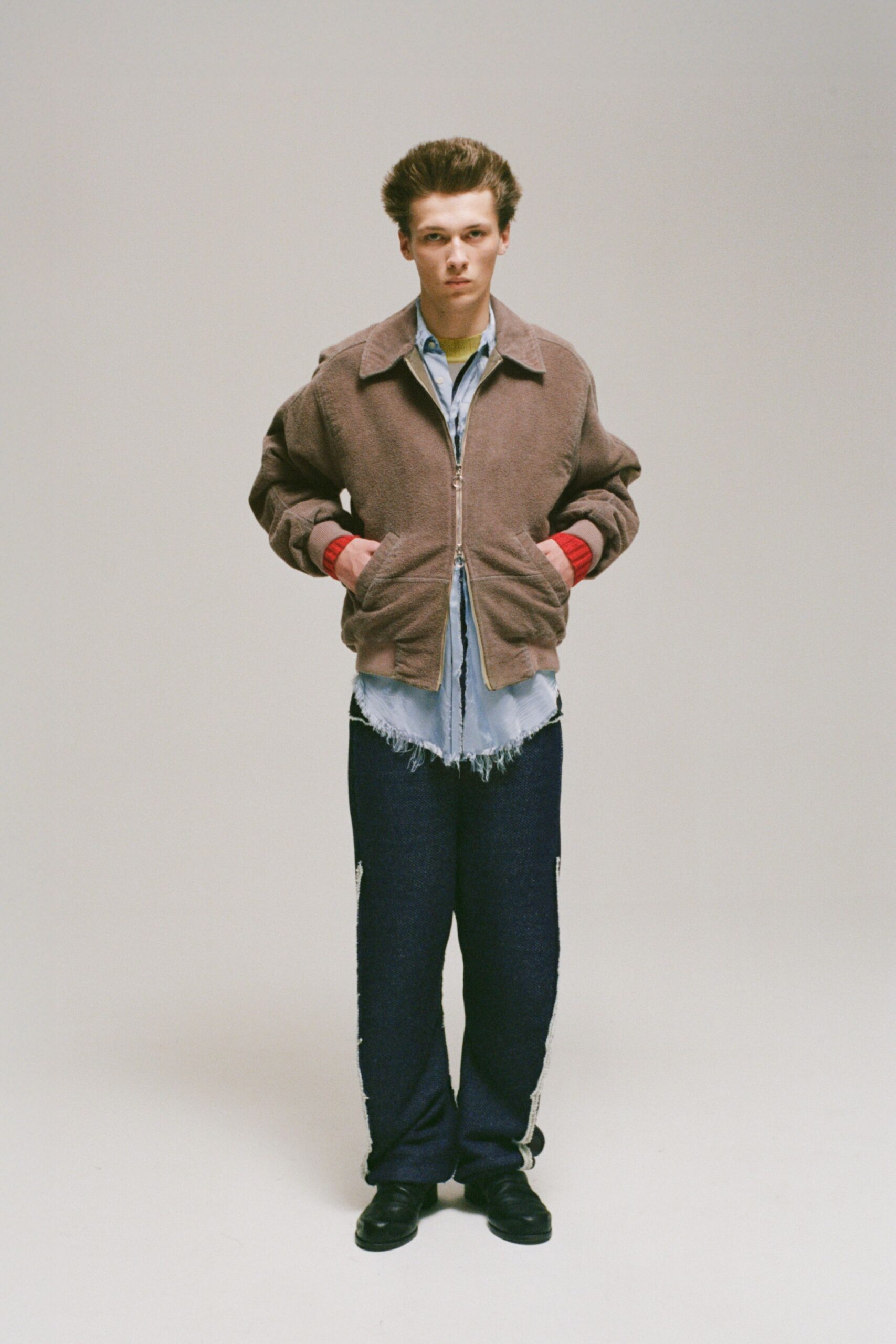 brown relaxed jacket with blue shirt