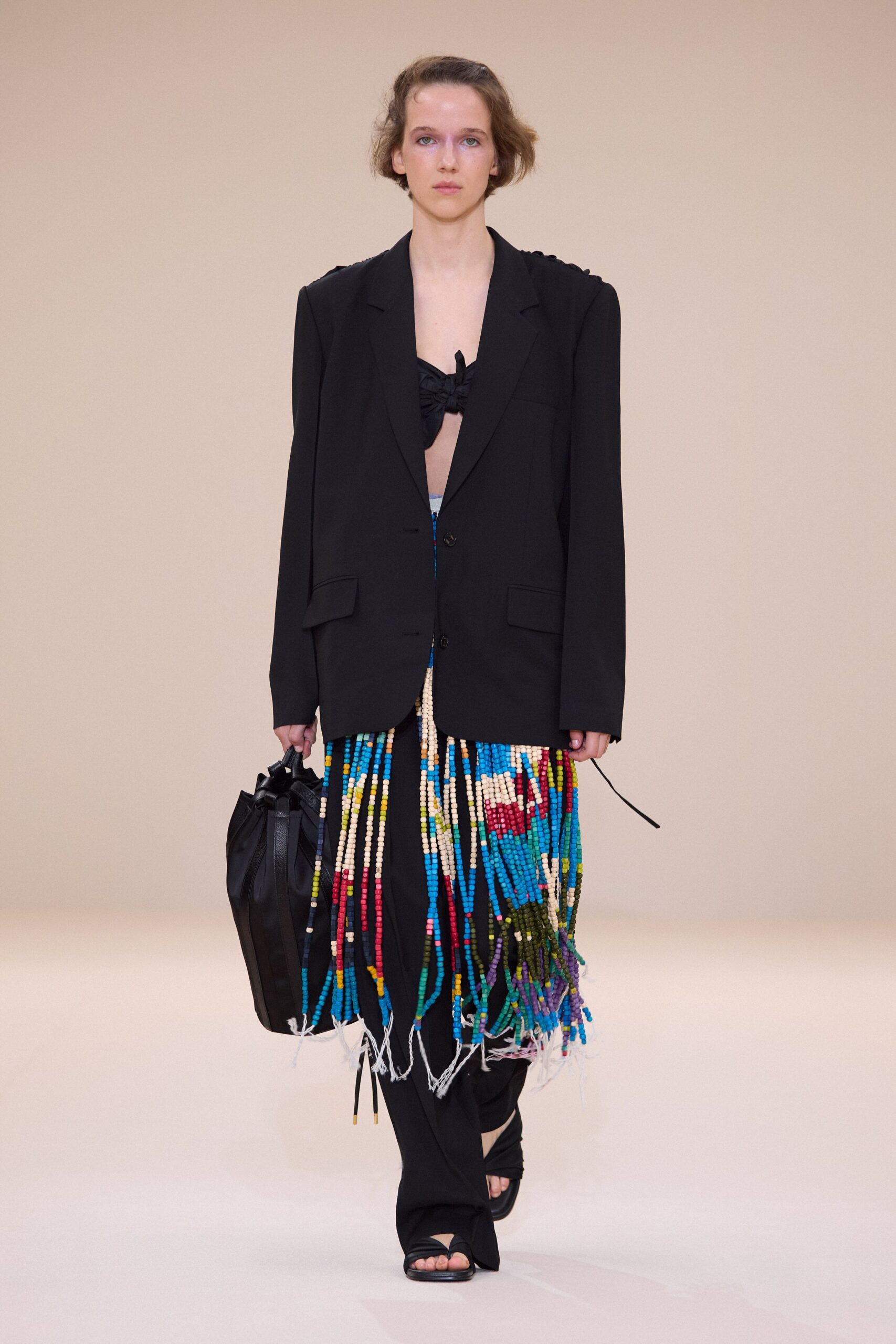 black oversized blazer with multi skirt