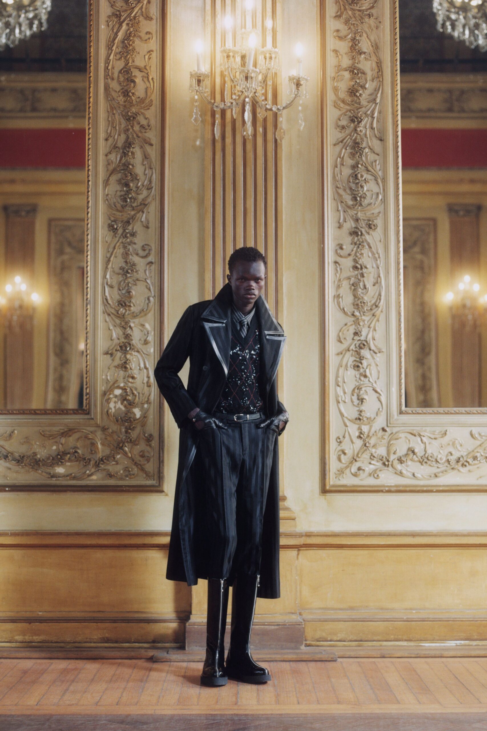 black leather coat with printed shirt