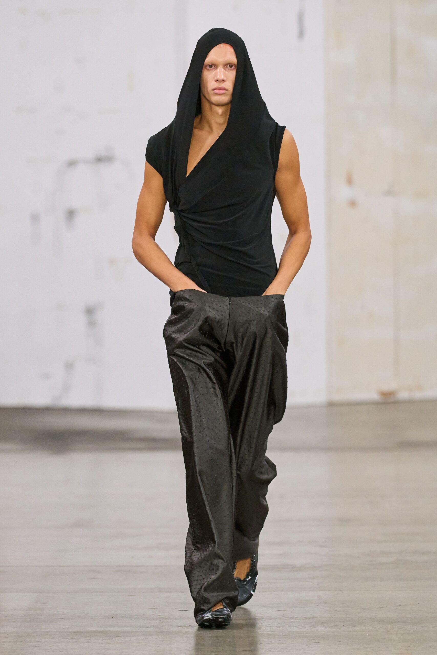 black fitted top and relaxed pants