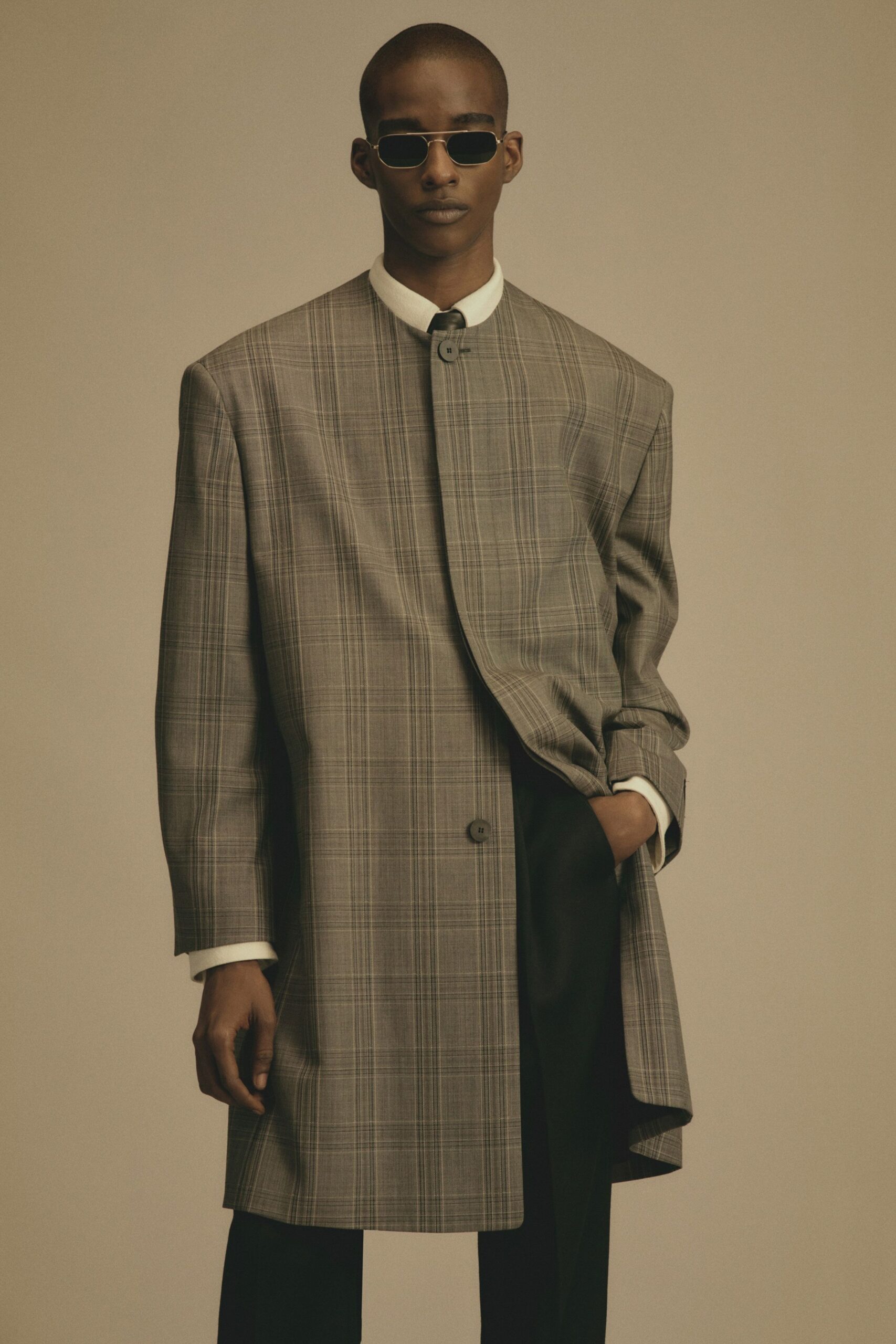 gray wool coat with black pants